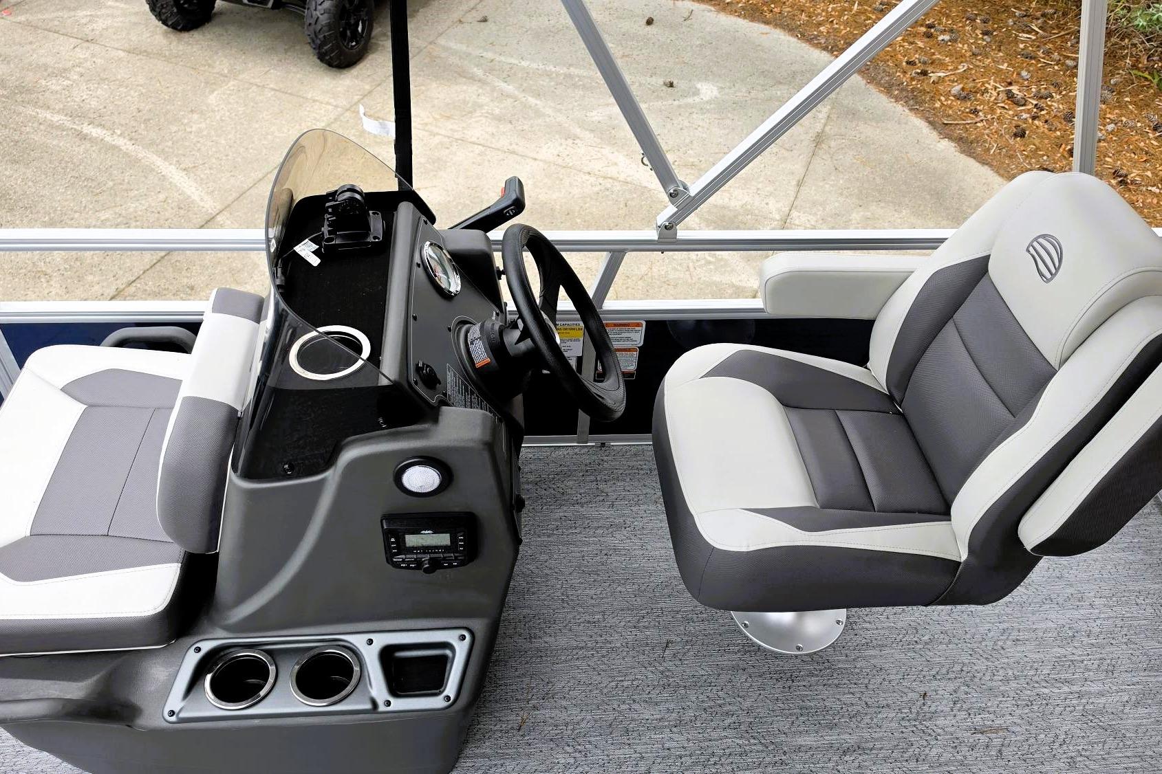 2026 Sun Tracker Bass Buggy 16 XL Select interior with steering console and seating.
