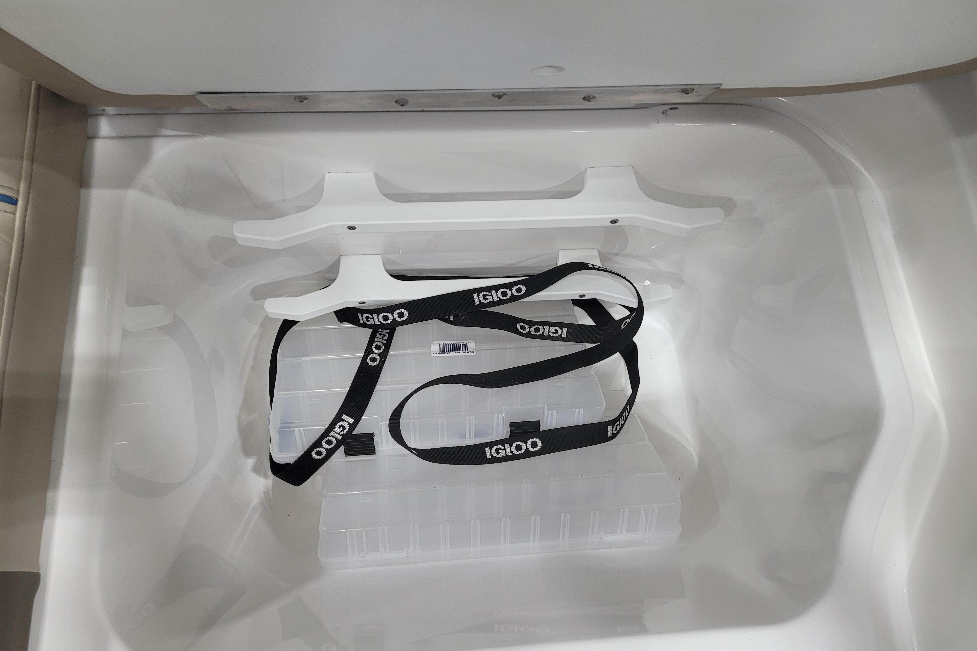 Interior of a 2026 Tahoe 2150 boat cooler with Igloo strap.