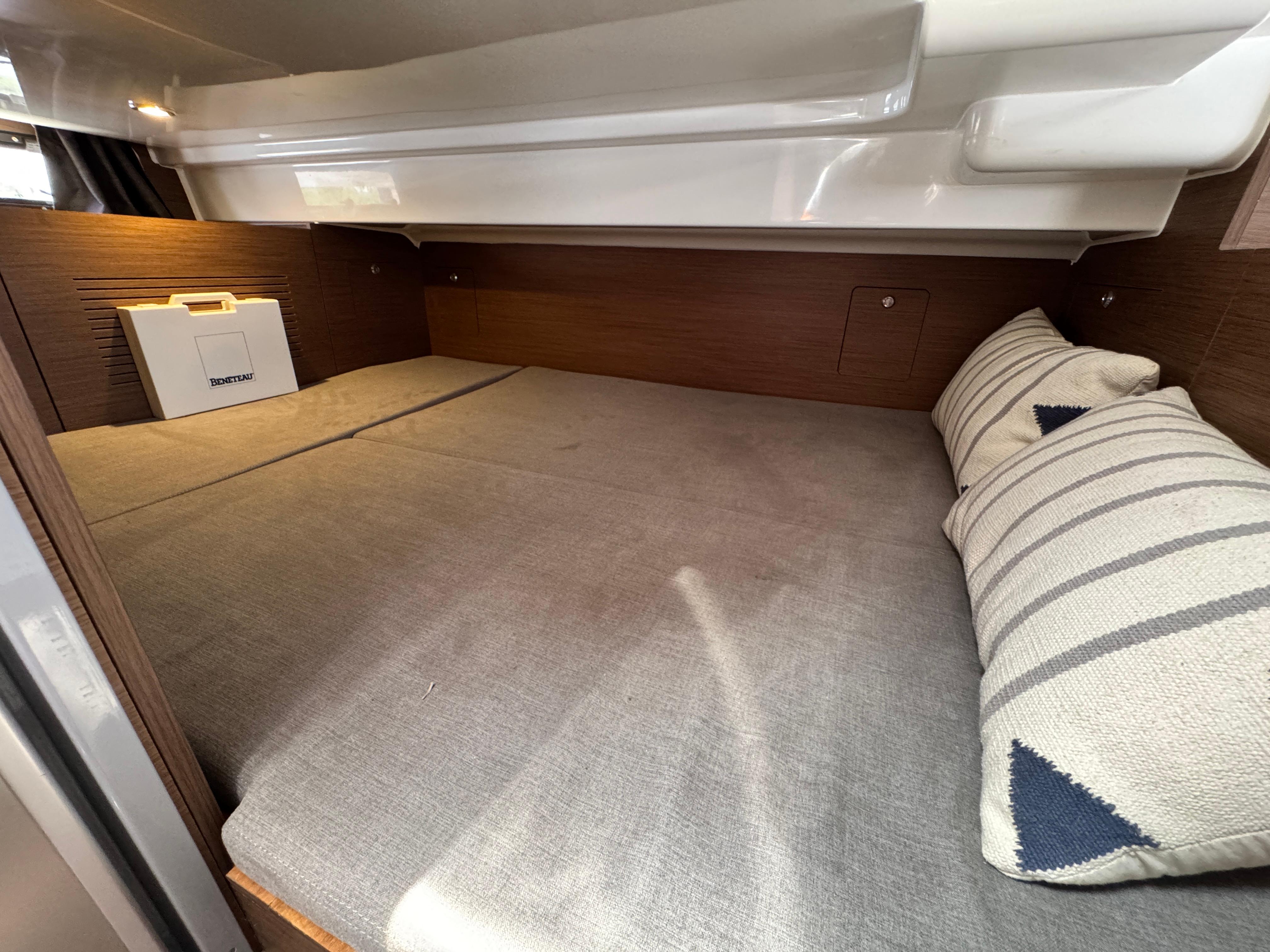 Cozy cabin interior of 2022 Beneteau Flyer 9 SUNdeck with comfortable bedding.