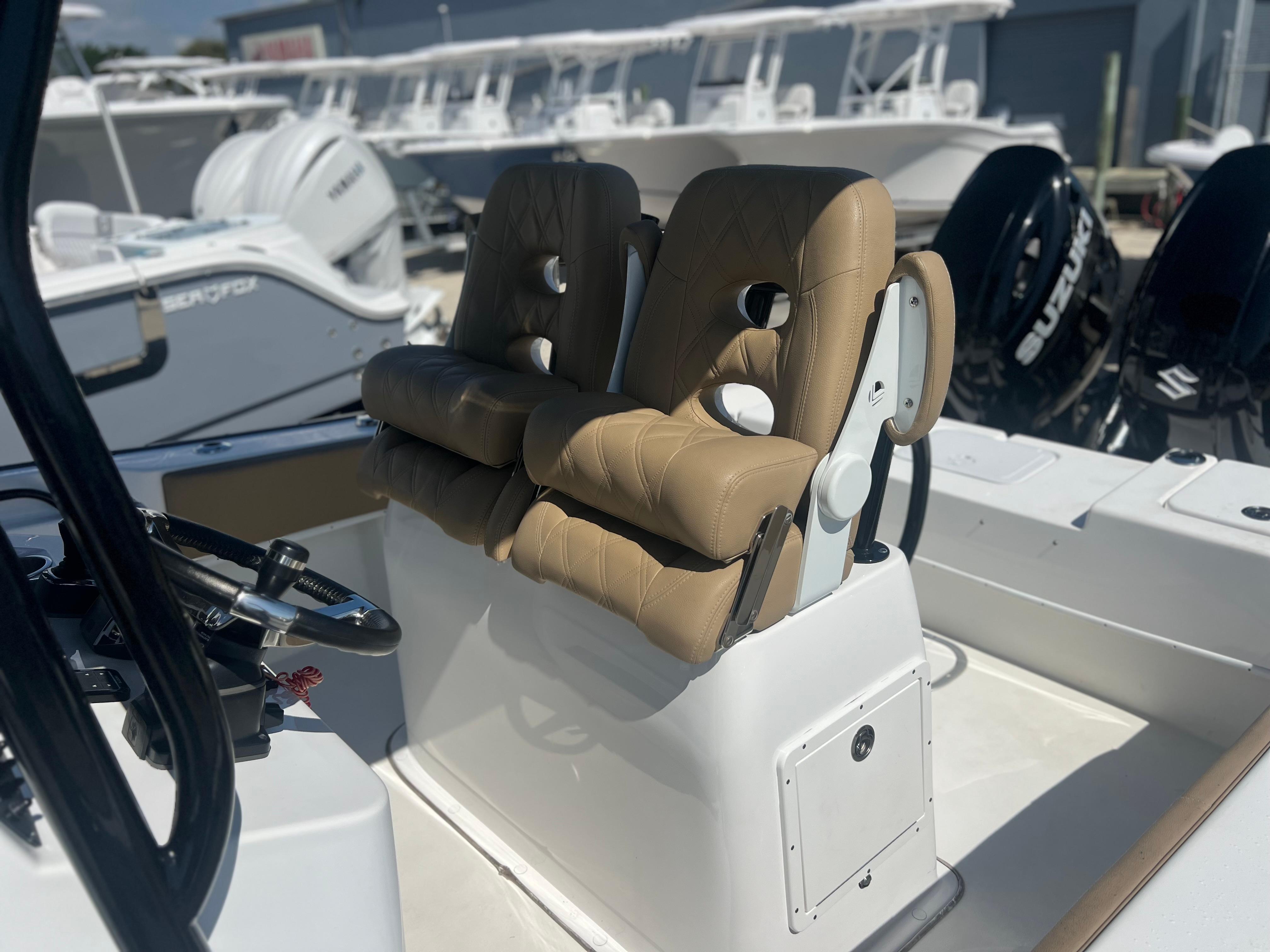 2022 Cape Horn 24 XS boat with tan seats and modern console design.