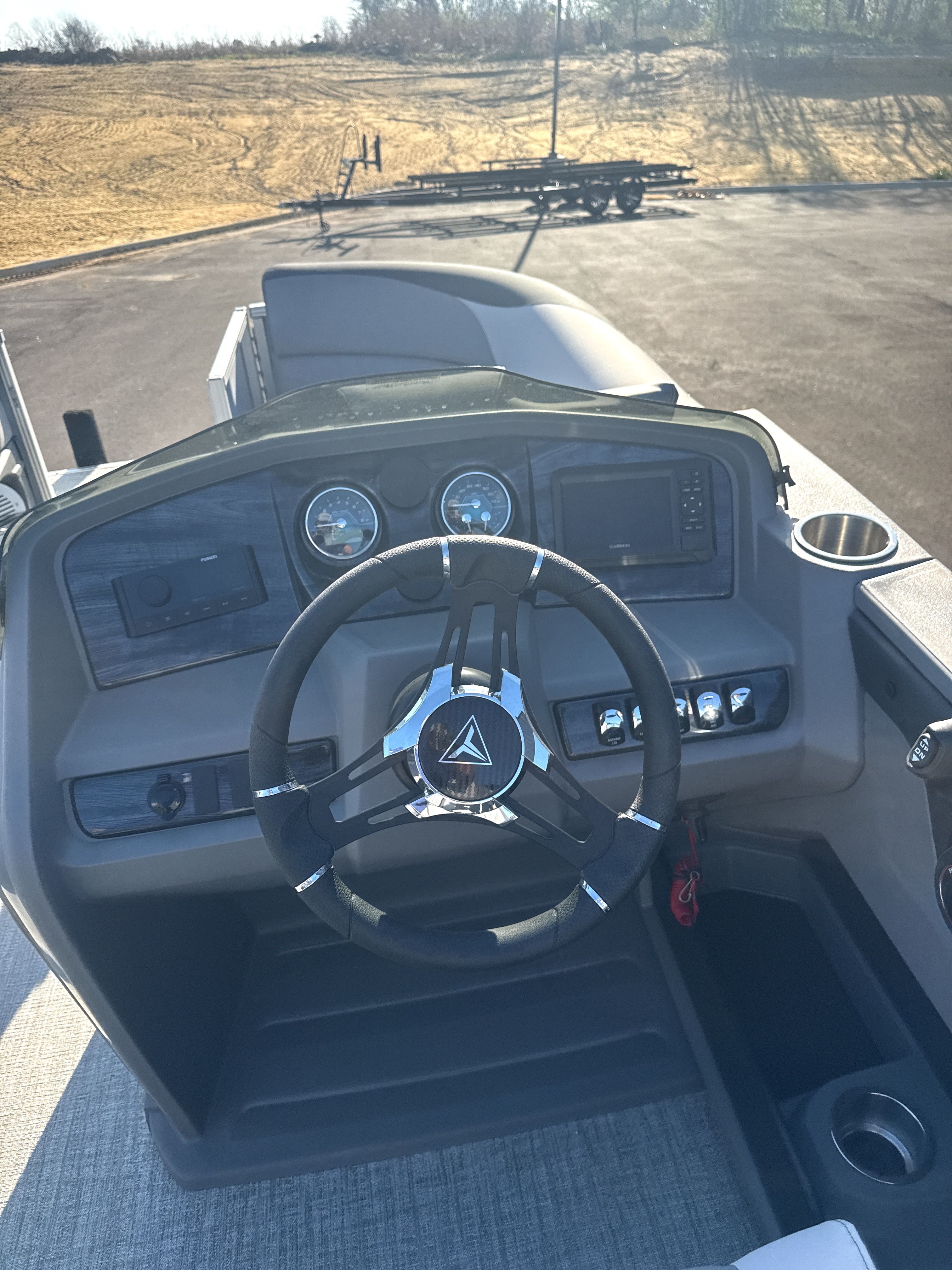 2026 Tahoe LTZ Quad Lounge Shift boat steering console.