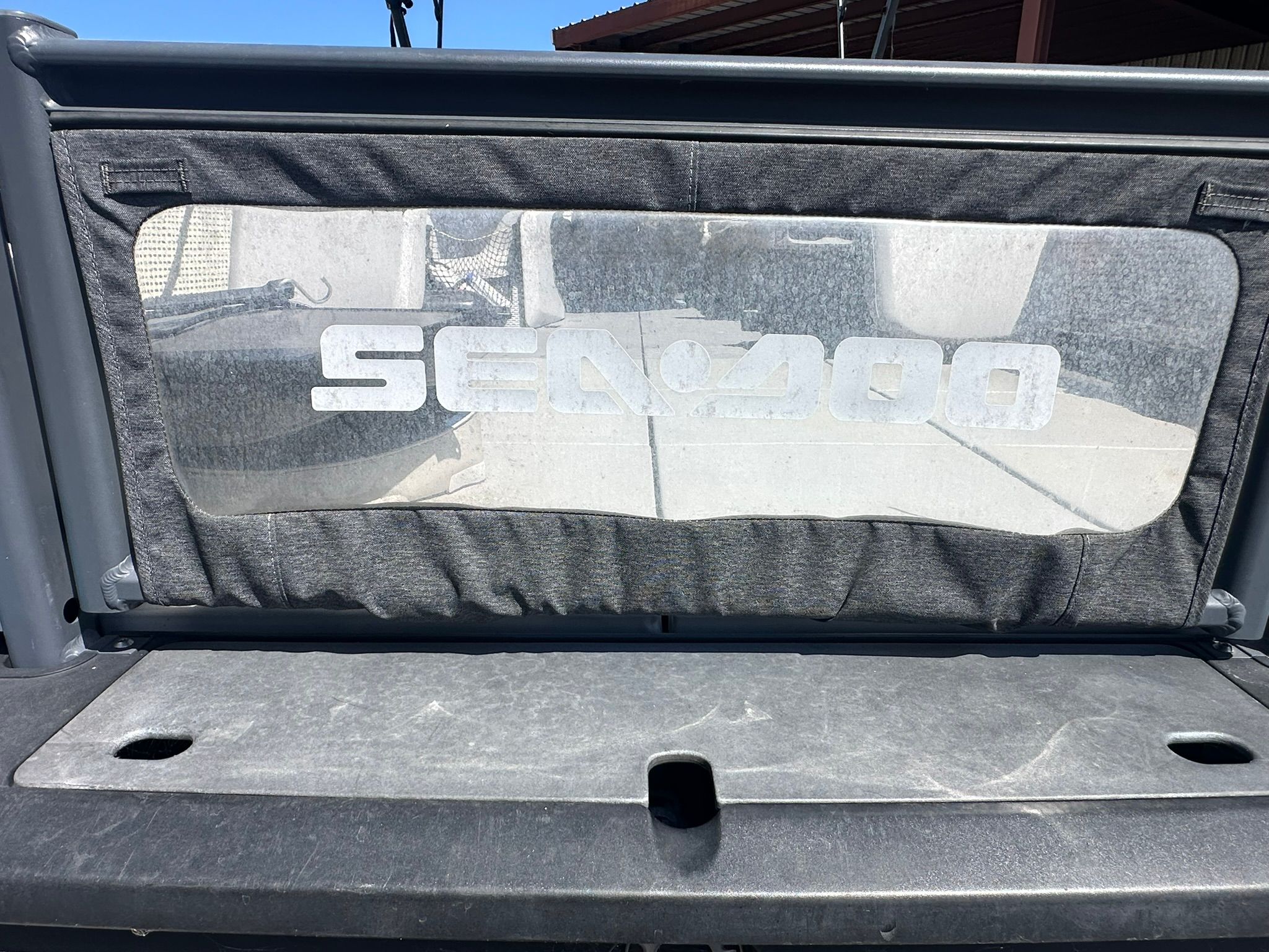 Rear view of a Sea-Doo 21 SWITCH SPORT with logo on the cover.