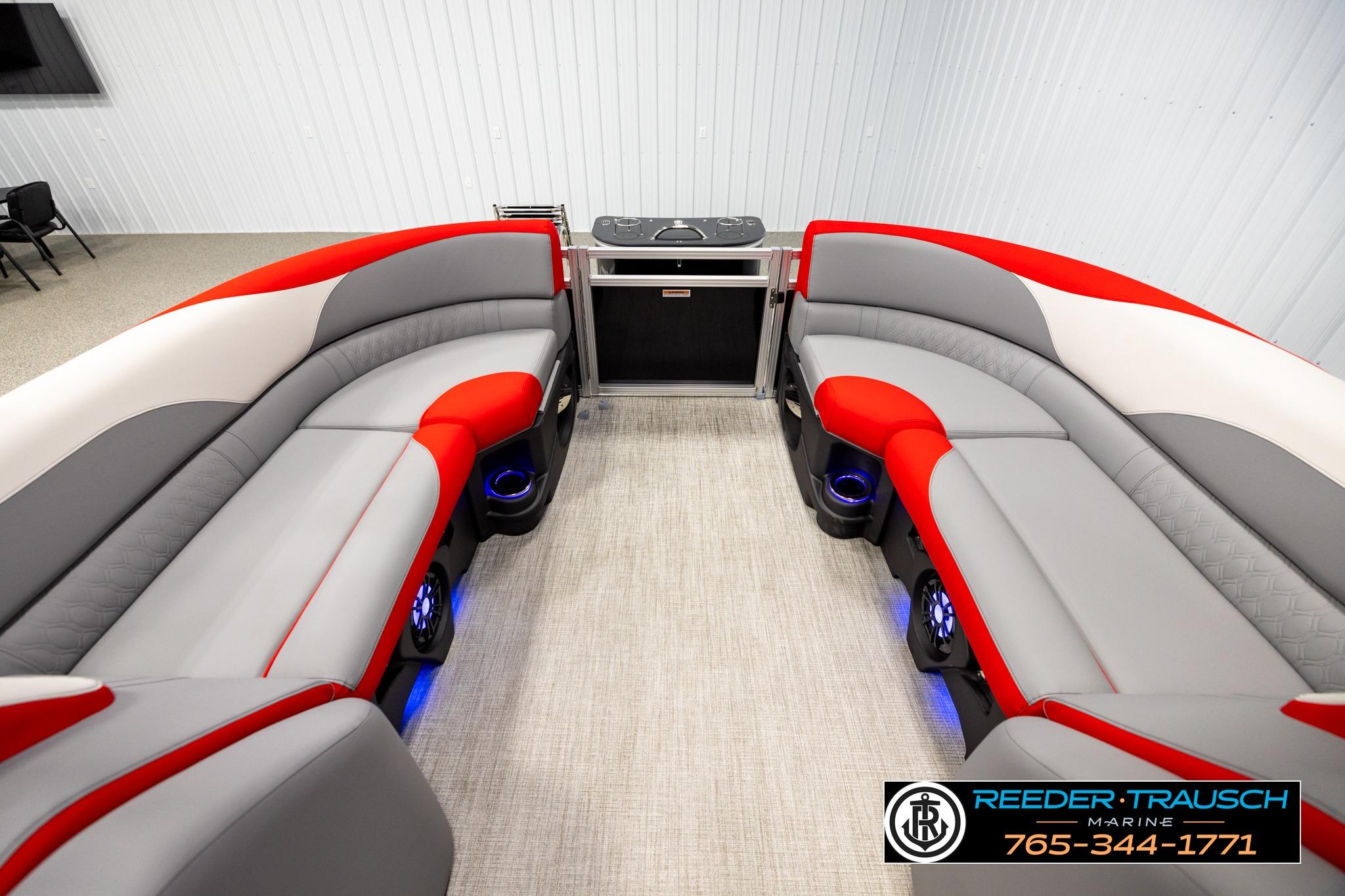Luxurious 2026 Avalon LSZ QL boat interior with stylish red and gray seating.