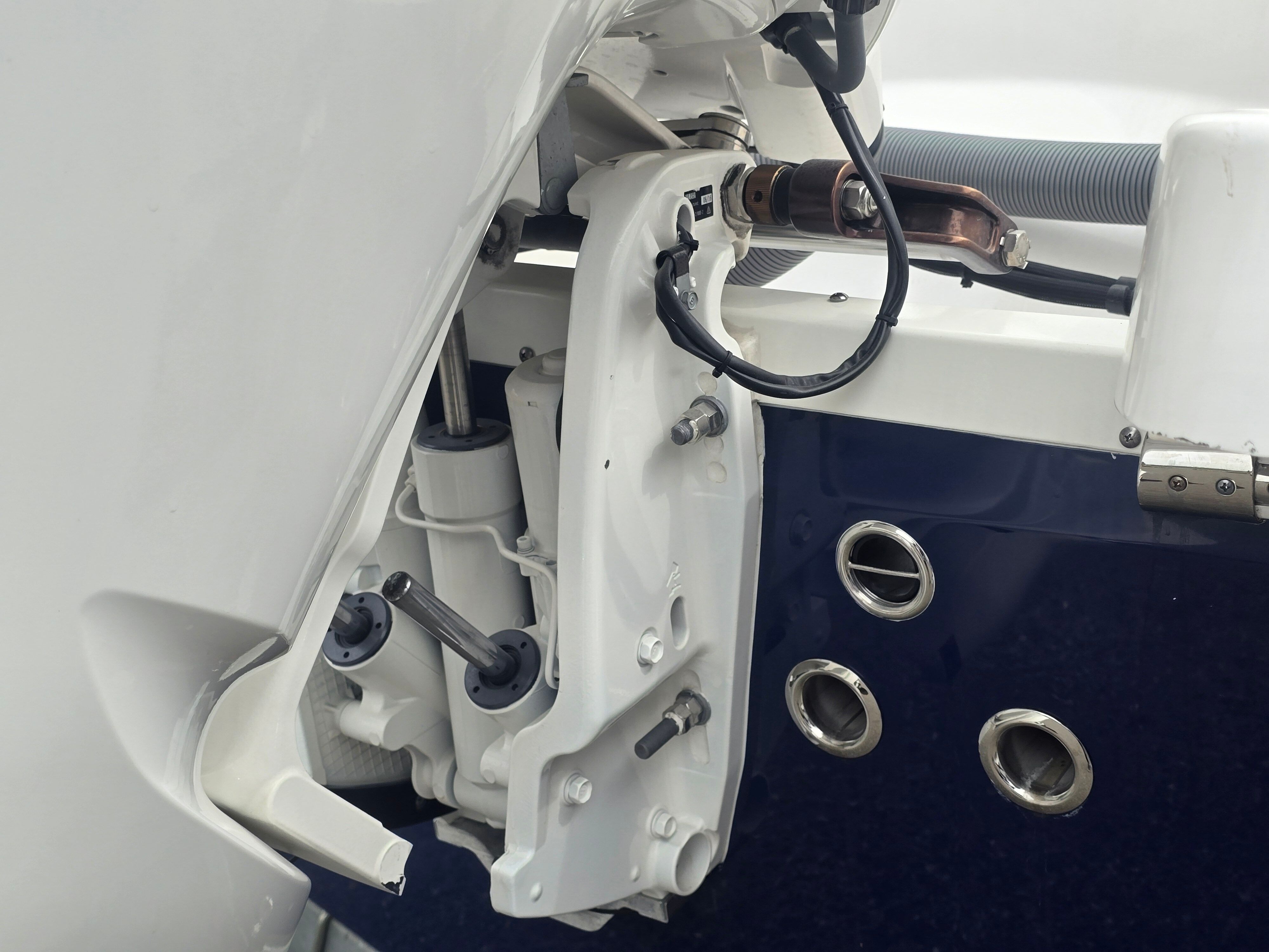 Close-up of the outboard motor on a 2017 Everglades 230 Dual Console boat.
