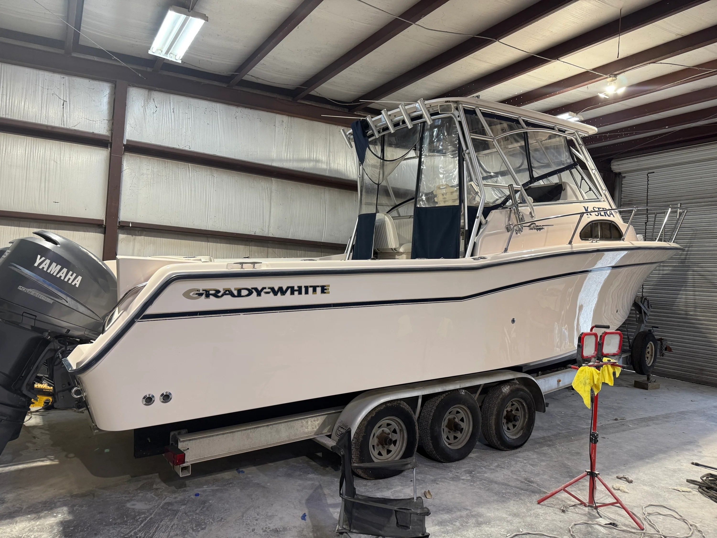 2002 Grady-White Marlin 300 boat in storage facility.