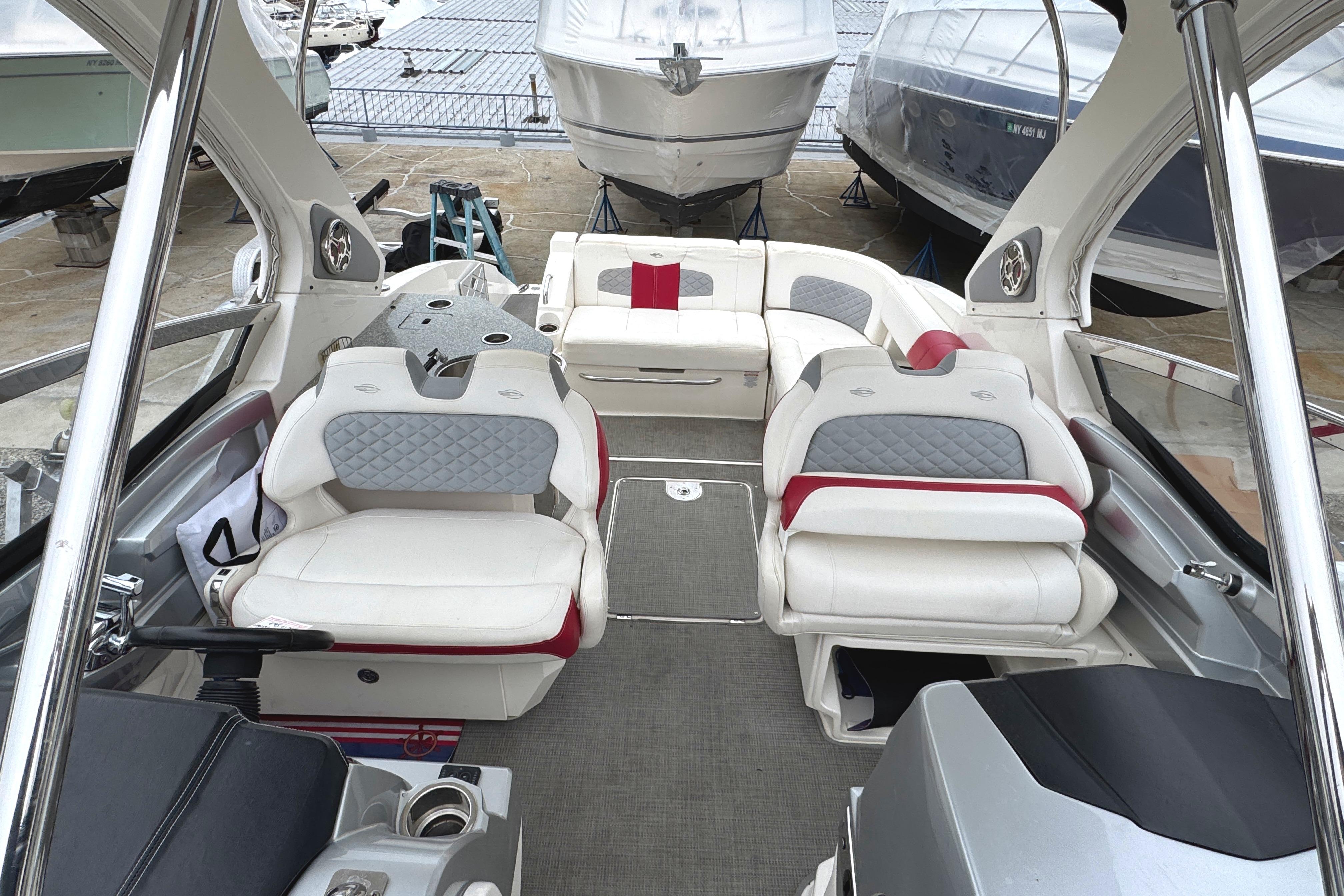 2012 Chaparral 327 SSX boat interior with luxurious seating and modern design.