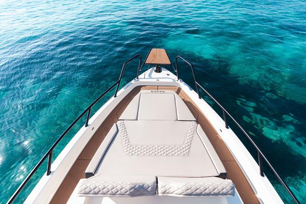 Manufacturer Provided Image: Navan S30 2026 boat on clear turquoise water, featuring a luxurious sun deck.