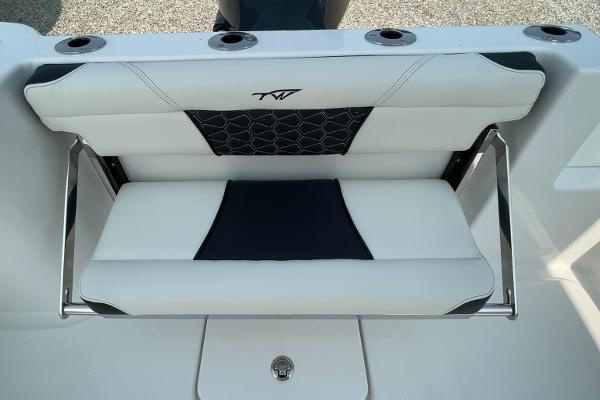 2025 Tidewater 232 CC Adventure boat seat with sleek design and integrated rod holders.
