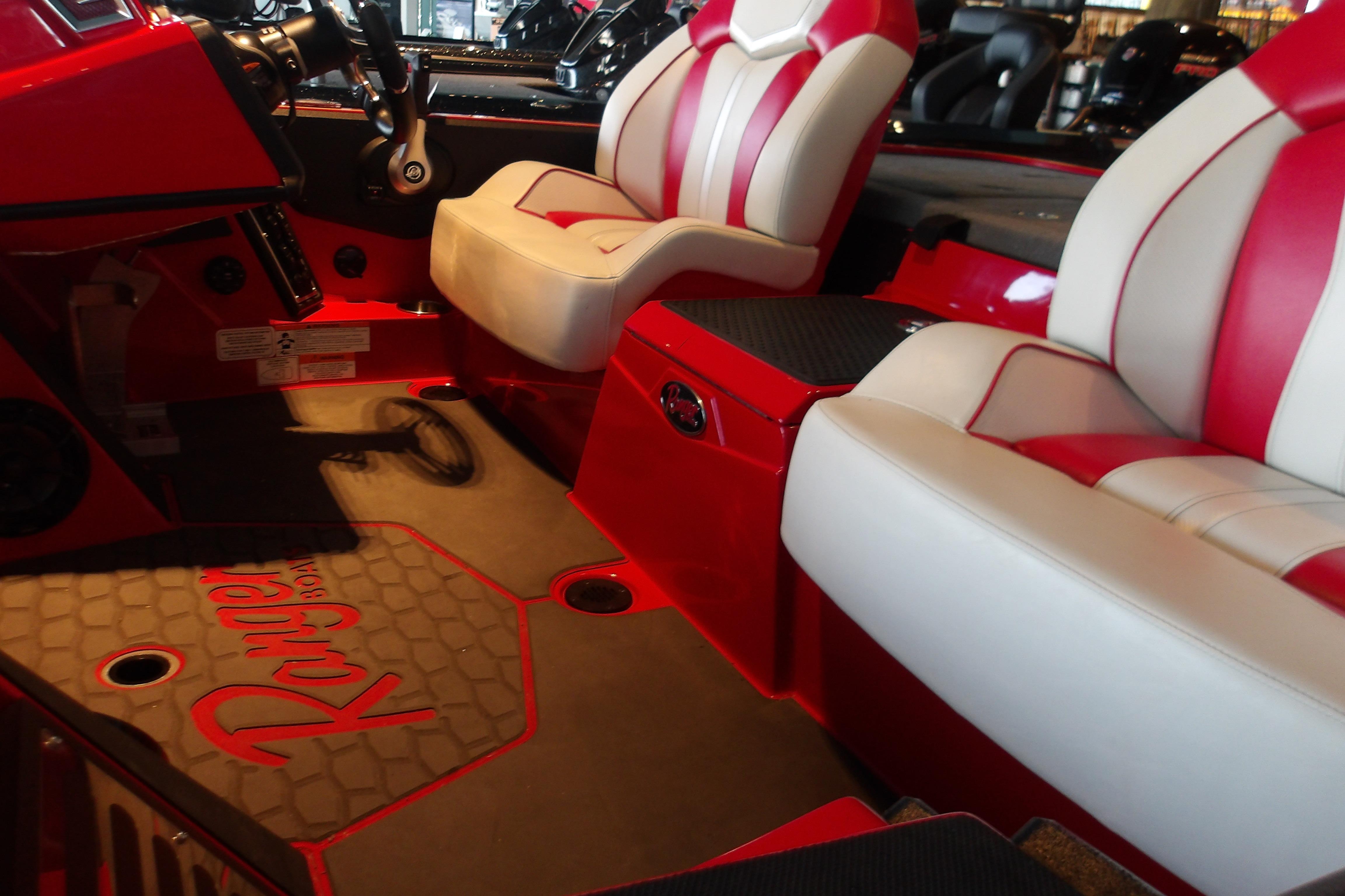 2025 Ranger Z519R Cup-Equipped boat interior with red and white seating and branded flooring.
