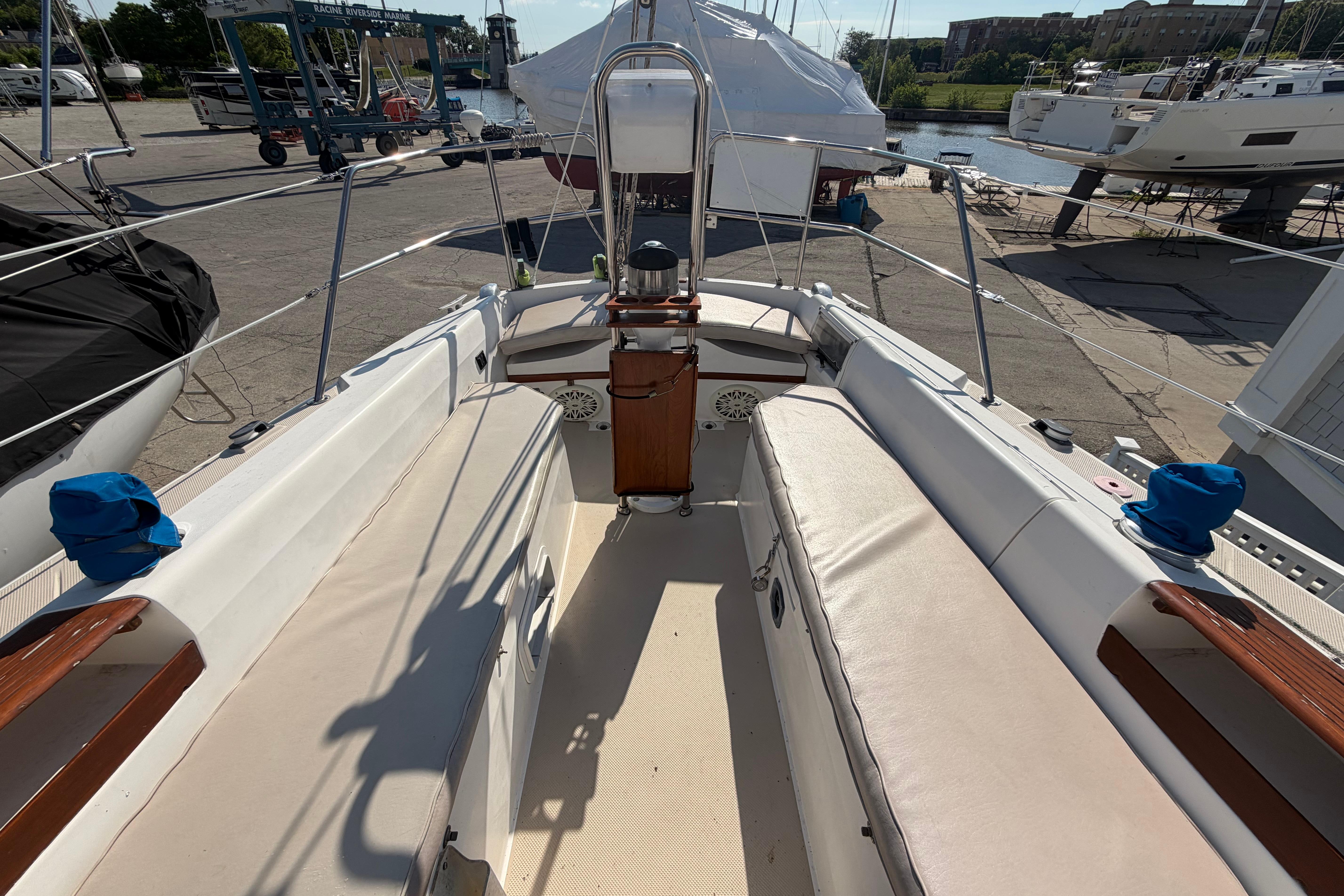 Cockpit of a 1988 Catalina 30 MkII sailboat, docked at a marina.