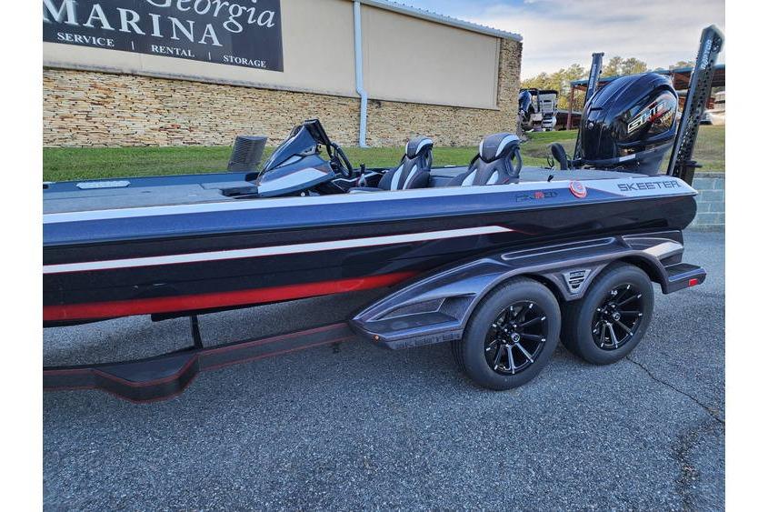 2026 Skeeter FXR21 Limited boat at Georgia Marina, featuring sleek design and dual axle trailer.
