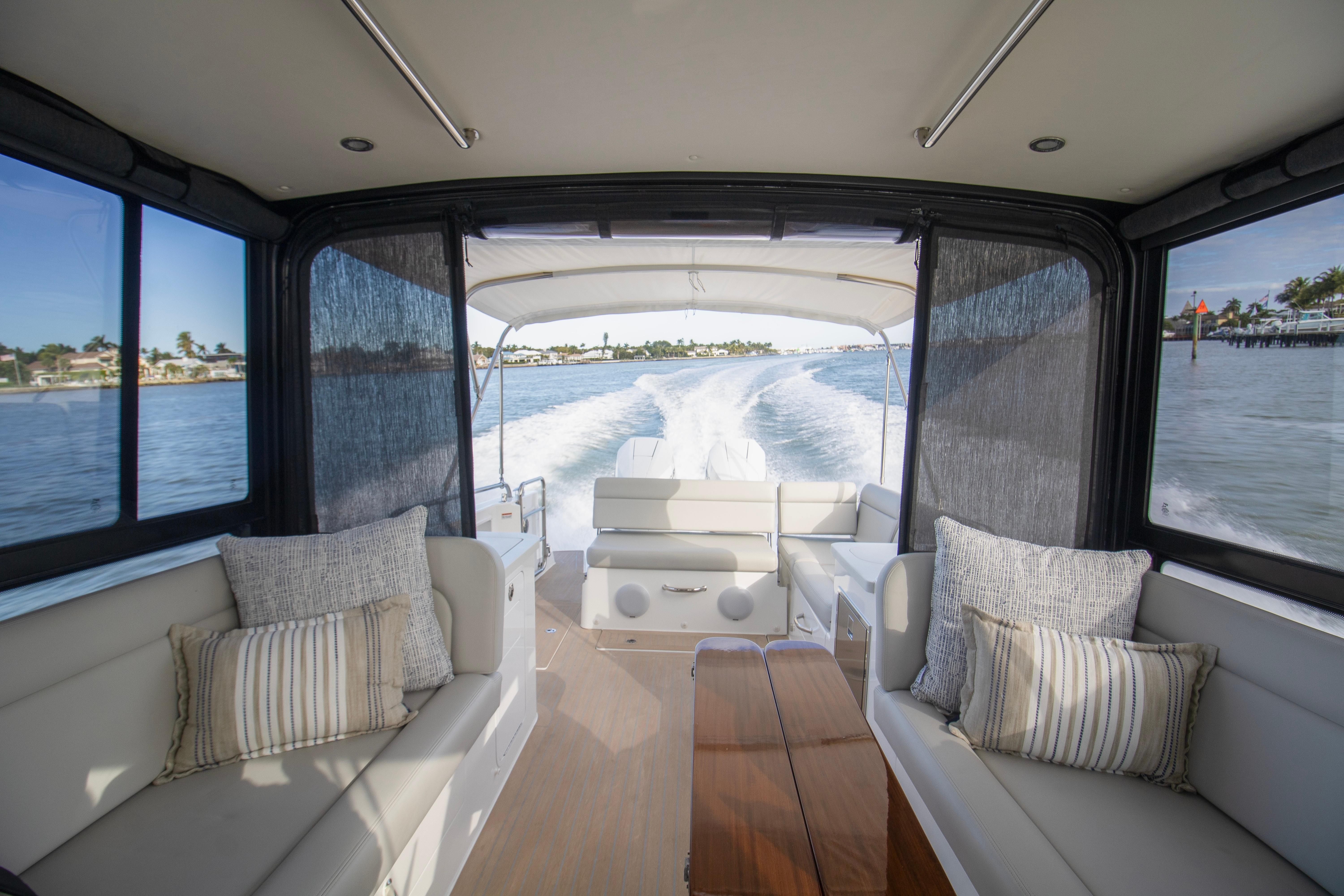 Luxurious interior of 2025 MJM 38 X yacht cruising on open water.