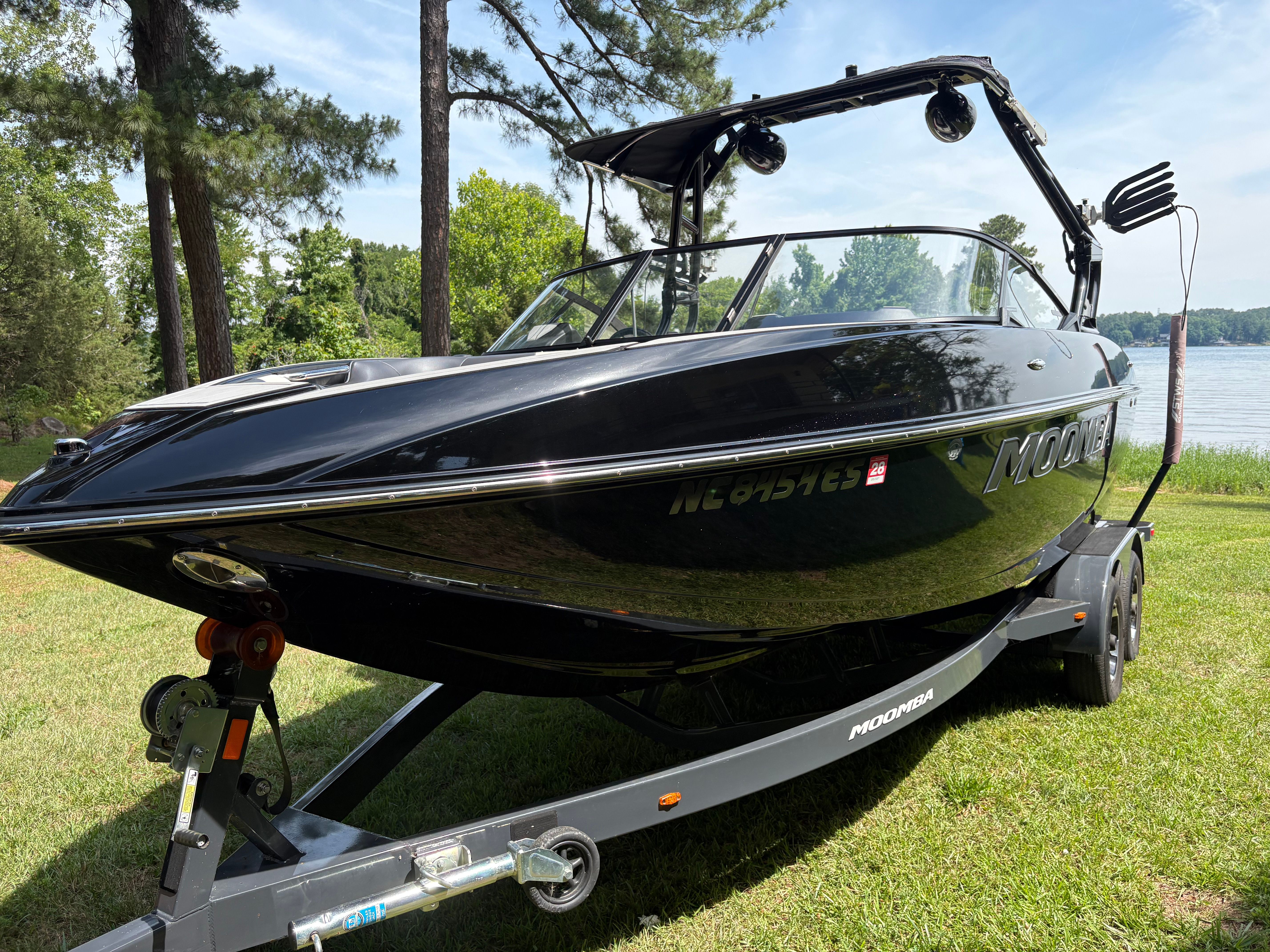 2021 Moomba Craz boat on trailer by lakeside.