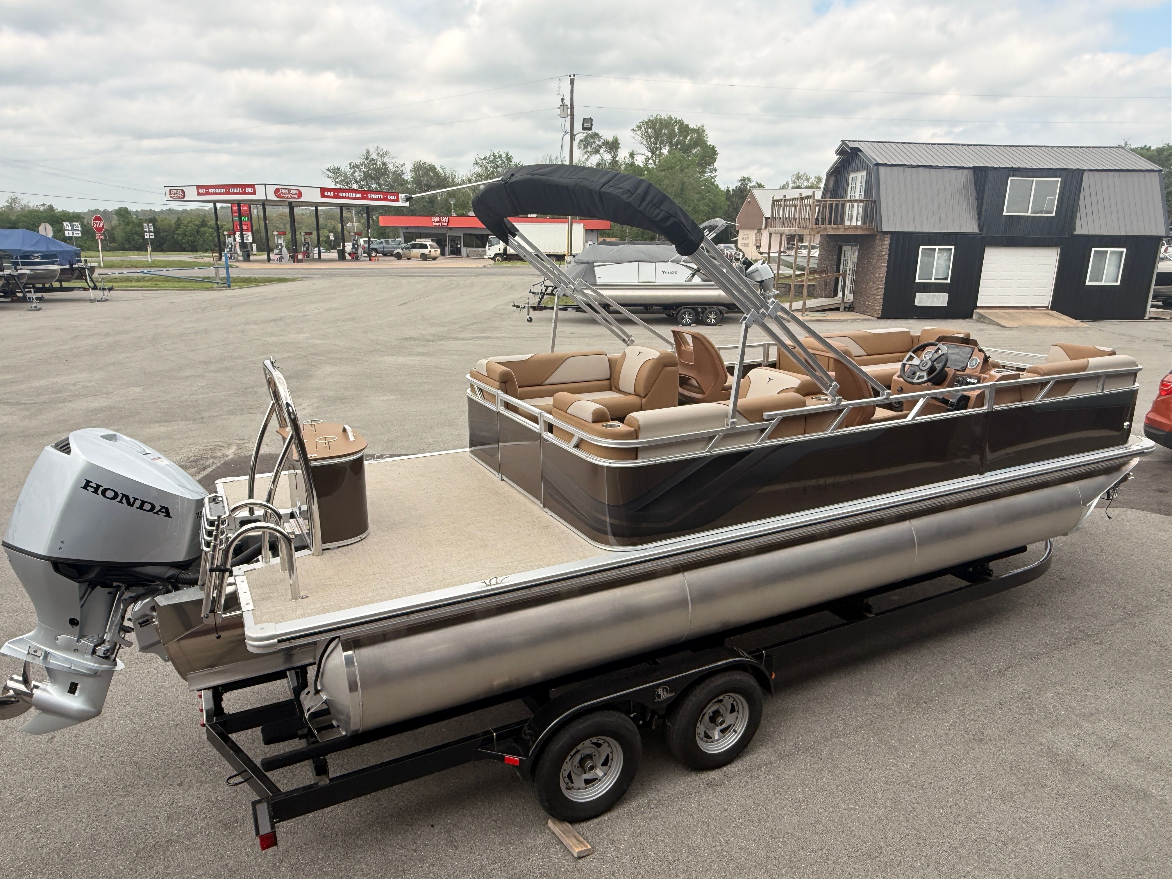 2026 Tahoe 2380 Sport Quad Lounger pontoon boat with Honda engine.