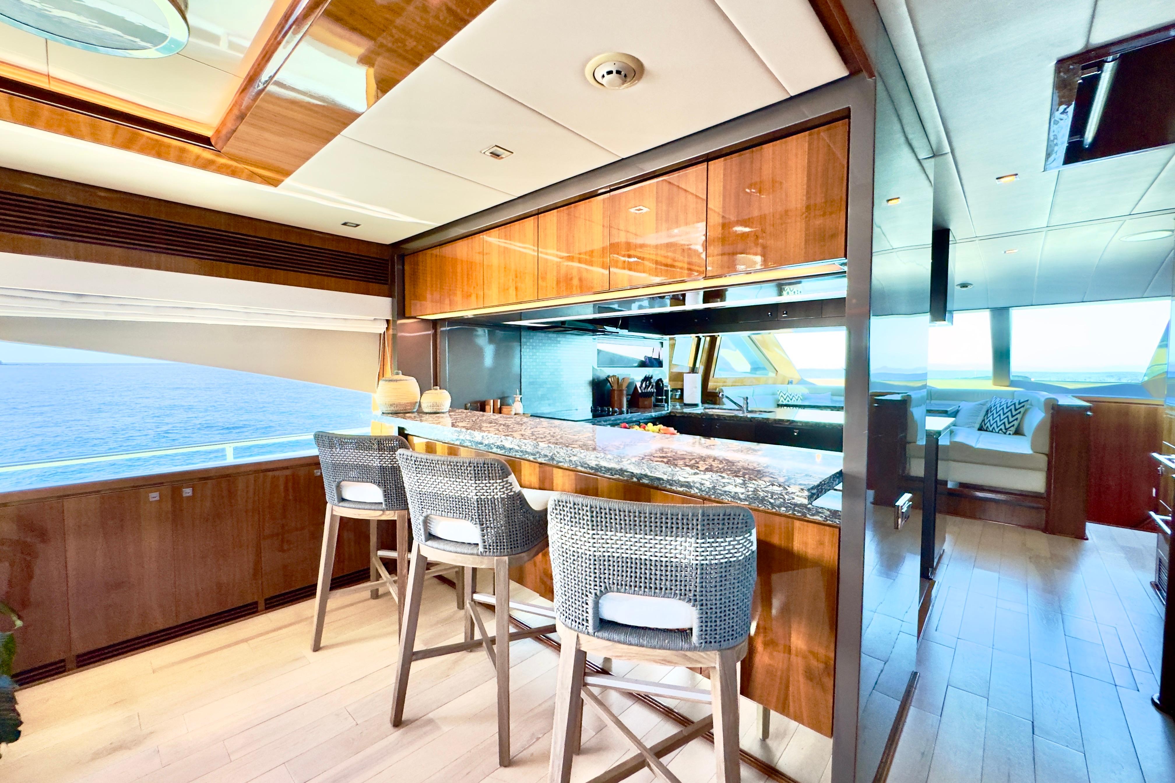 Luxurious Horizon E88 yacht interior with elegant bar and ocean view, 2011 model.
