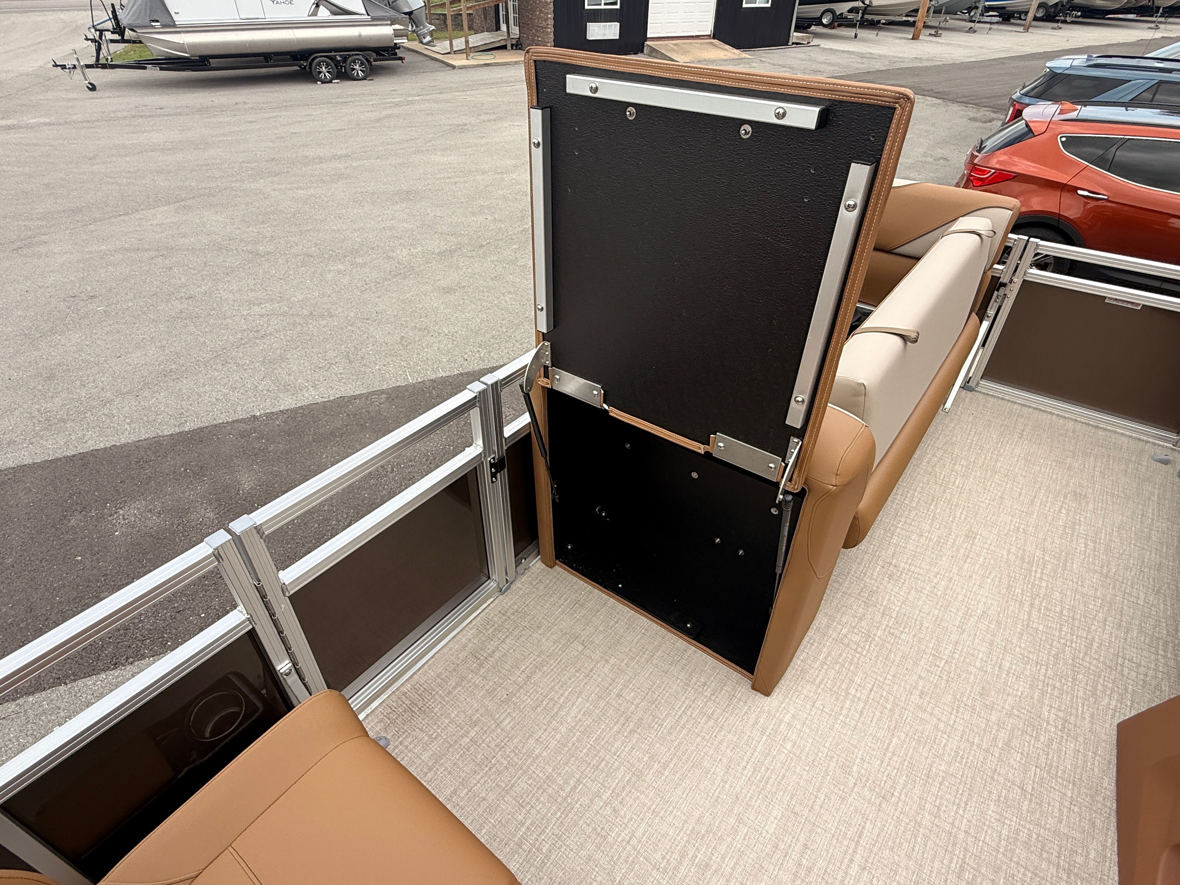 Interior of 2026 Tahoe 2380 Sport Quad Lounger with foldable seat.