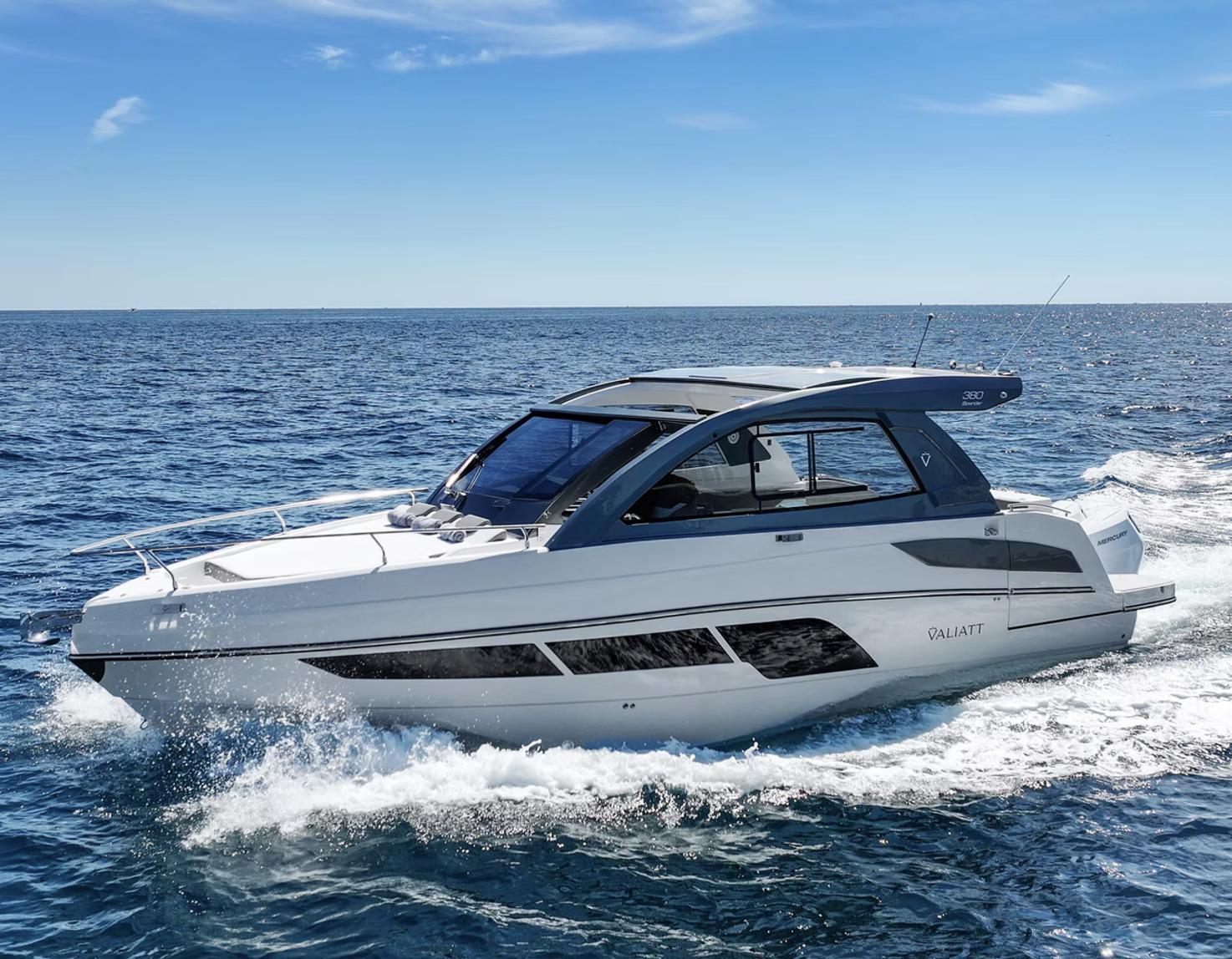 2025 Valiatt 380 Bowrider cruising on open sea under clear blue sky.