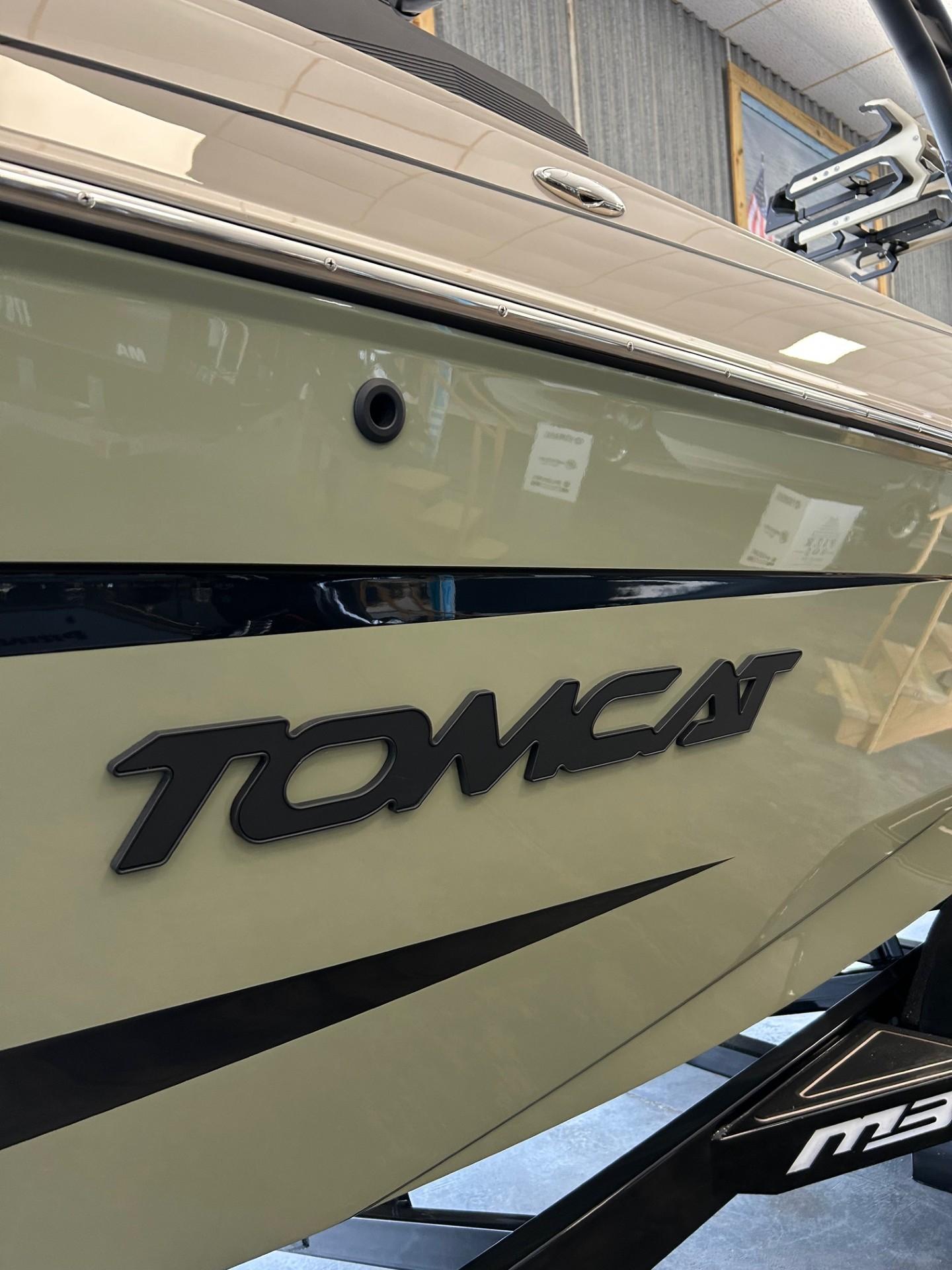2024 MB F22 Tomcat boat side view with logo in showroom.