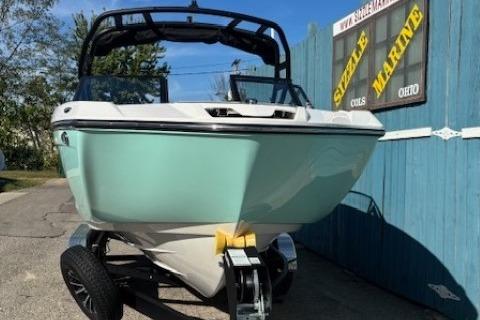 2026 Yamaha Boats 222S in mint green, displayed outdoors on a trailer.
