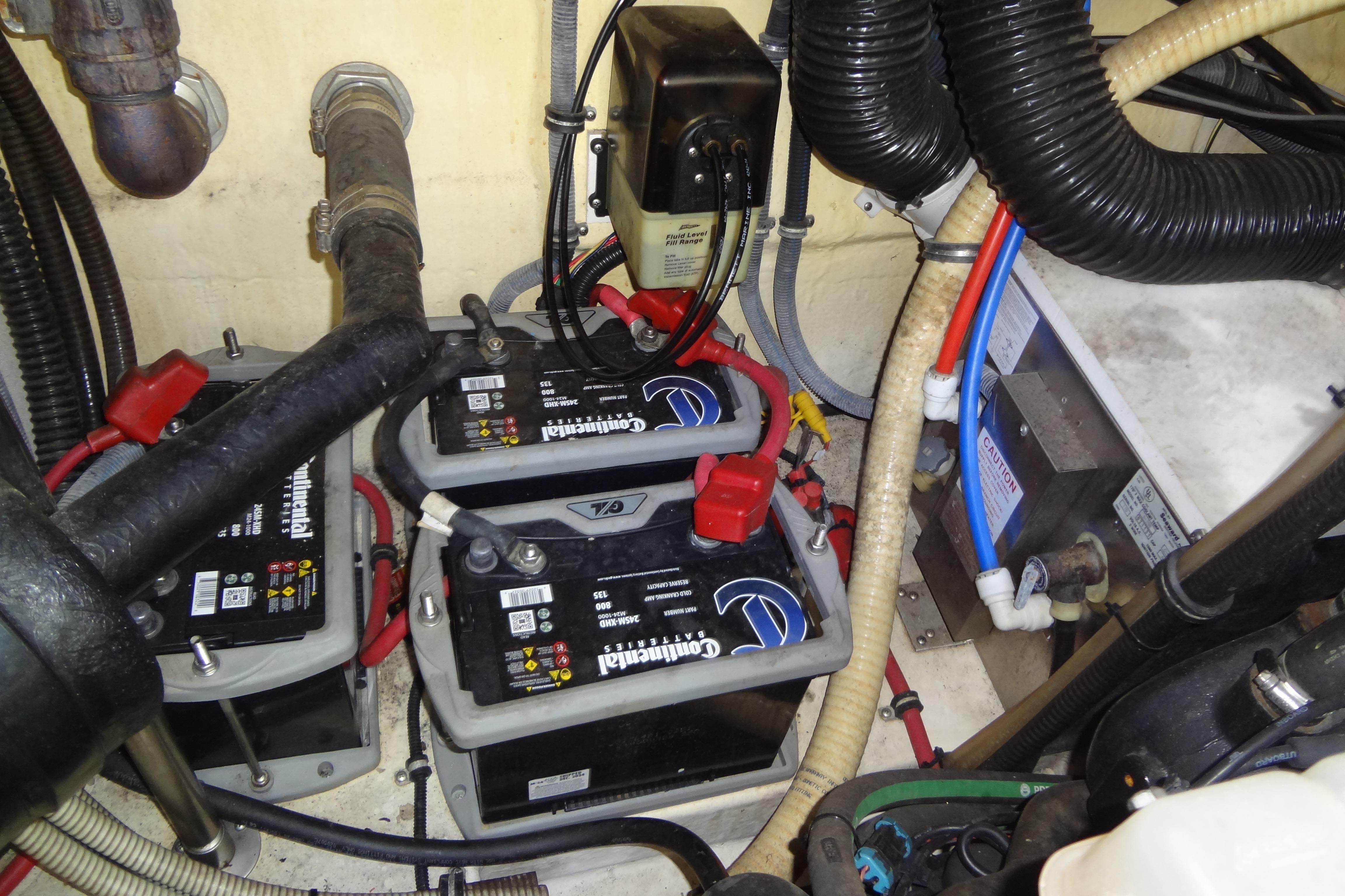 Engine compartment of 2007 Formula 34 Performance Cruiser with Continental batteries and wiring.