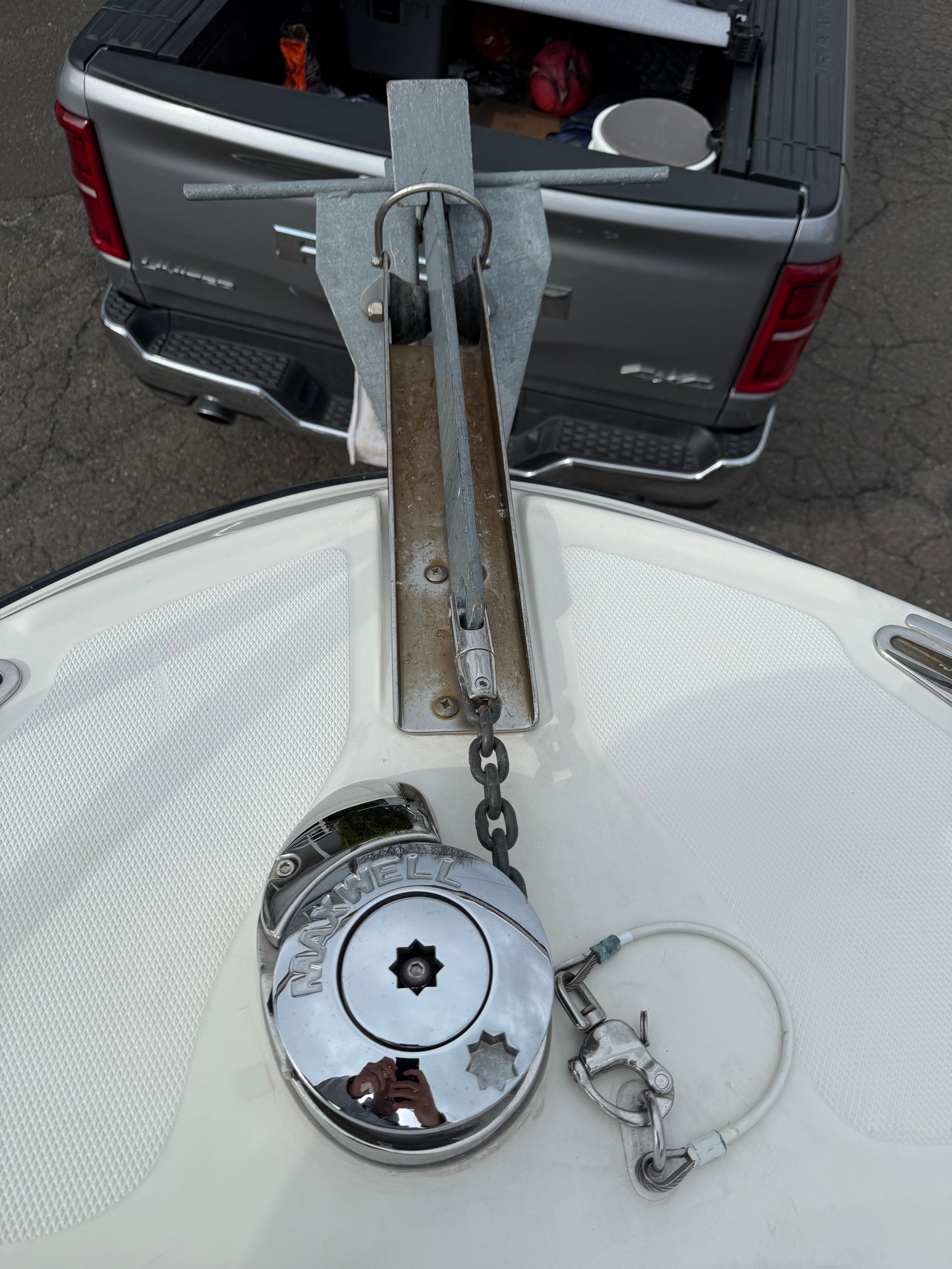 Hydra-Sports Vector 2200 VX 2008 anchor windlass and pickup truck rear view.