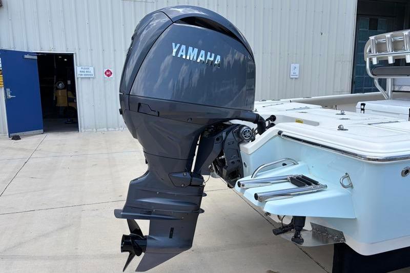 2025 Key West 210 Bay Reef with Yamaha outboard motor, docked at a marina.