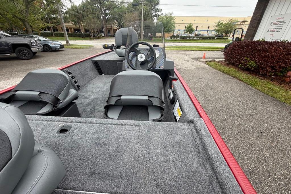2026 Tracker Bass Tracker Classic XL boat interior with seating and steering wheel.
