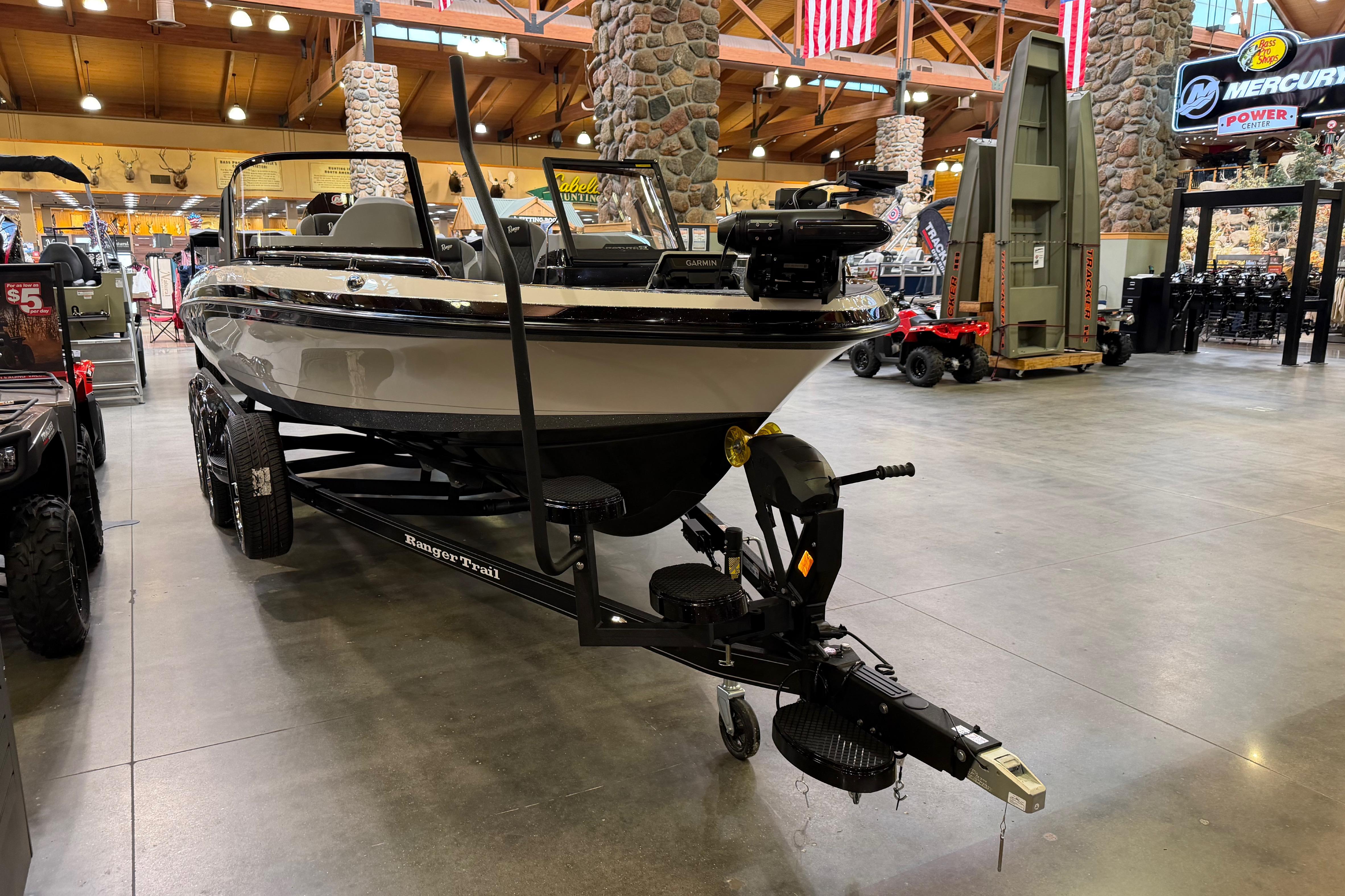 2026 Ranger 621FS Cup-Equipped boat displayed indoors on a trailer.