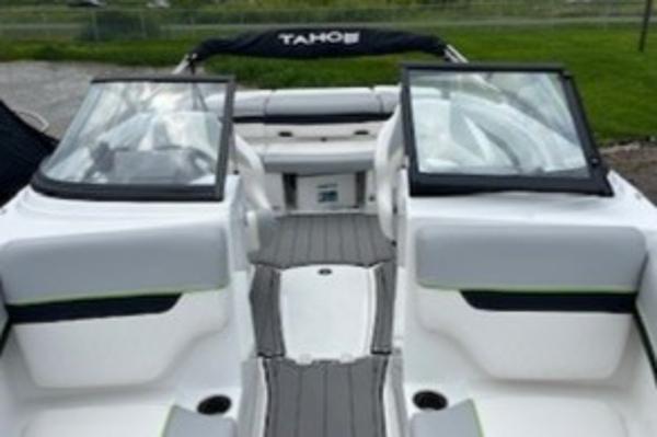 2024 Tahoe 210 Si boat interior with dual windshields and seating.