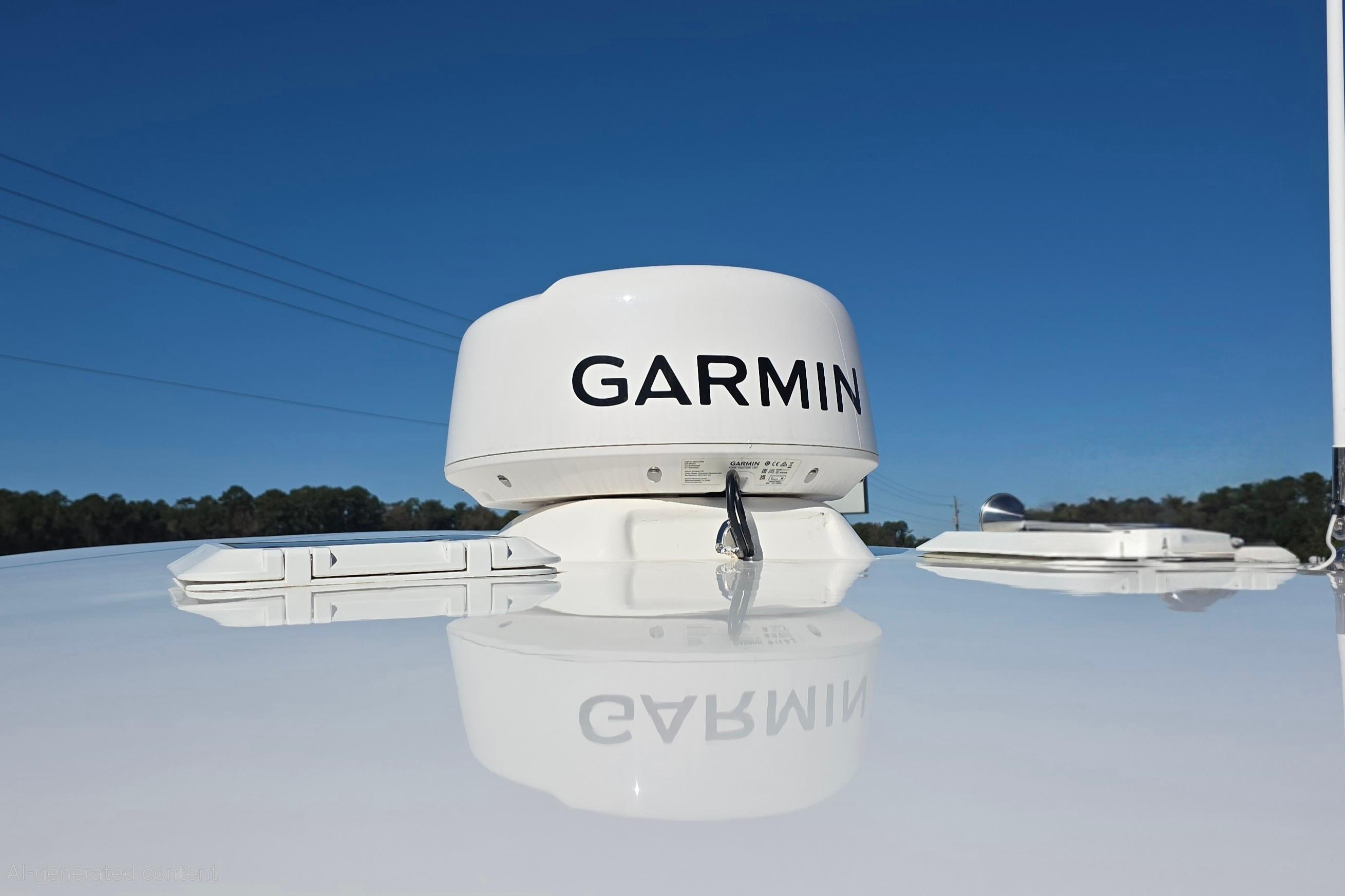 Garmin radar on 2024 NorthCoast 315 HT boat against clear blue sky.