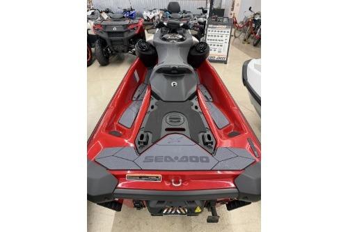 2024 Sea-Doo RXP-X 325 jet ski, red and black, rear view in showroom.