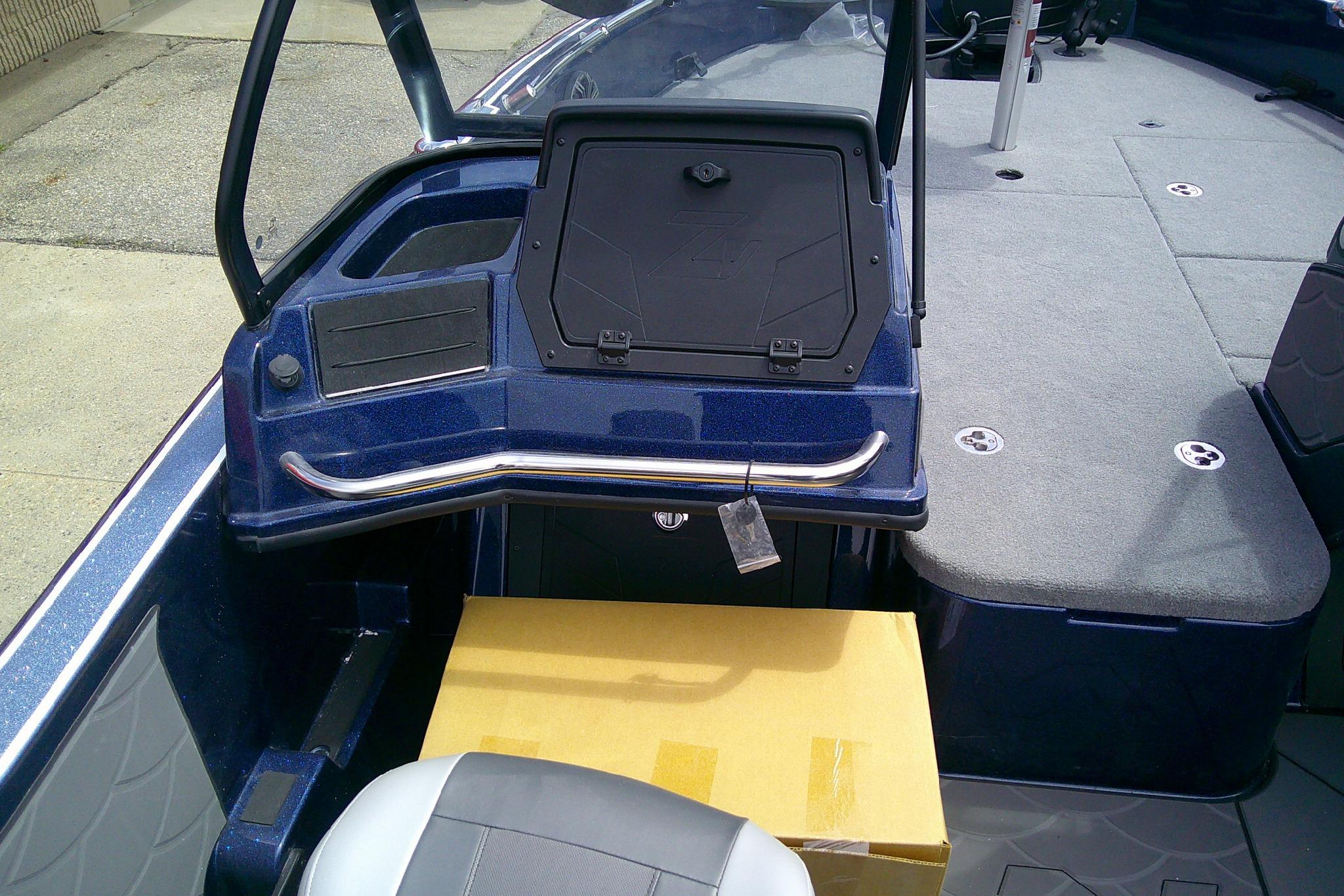 Interior of a 2026 Nitro ZV21 Pro boat with seating and storage compartments.