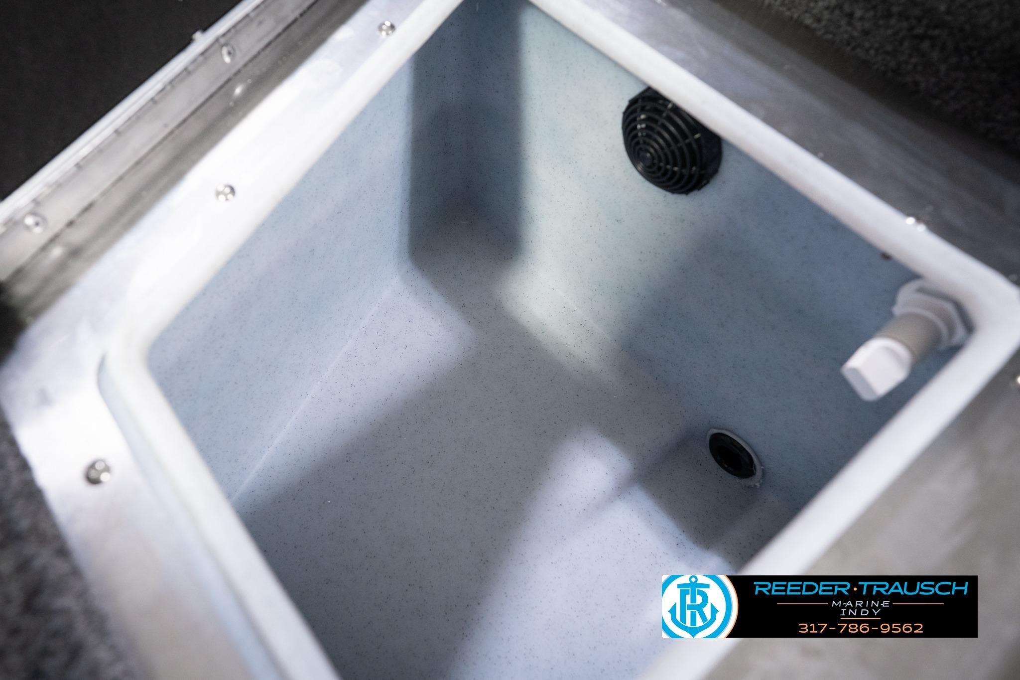 2026 Lund 1775 Impact XS SS livewell interior with drain and aerator.