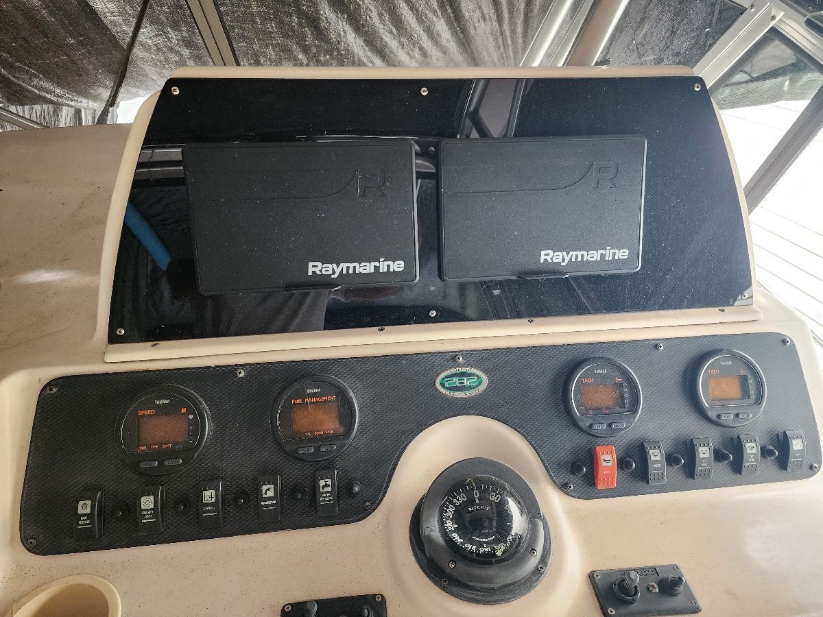 Dashboard of a 2005 Grady-White Sailfish 282 with Raymarine equipment.