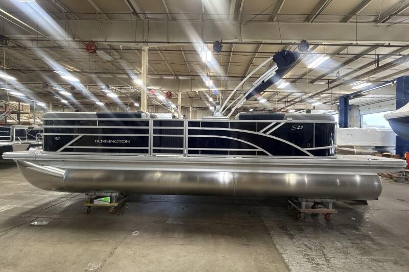2026 Bennington 23 SSRSF pontoon boat in a factory setting.