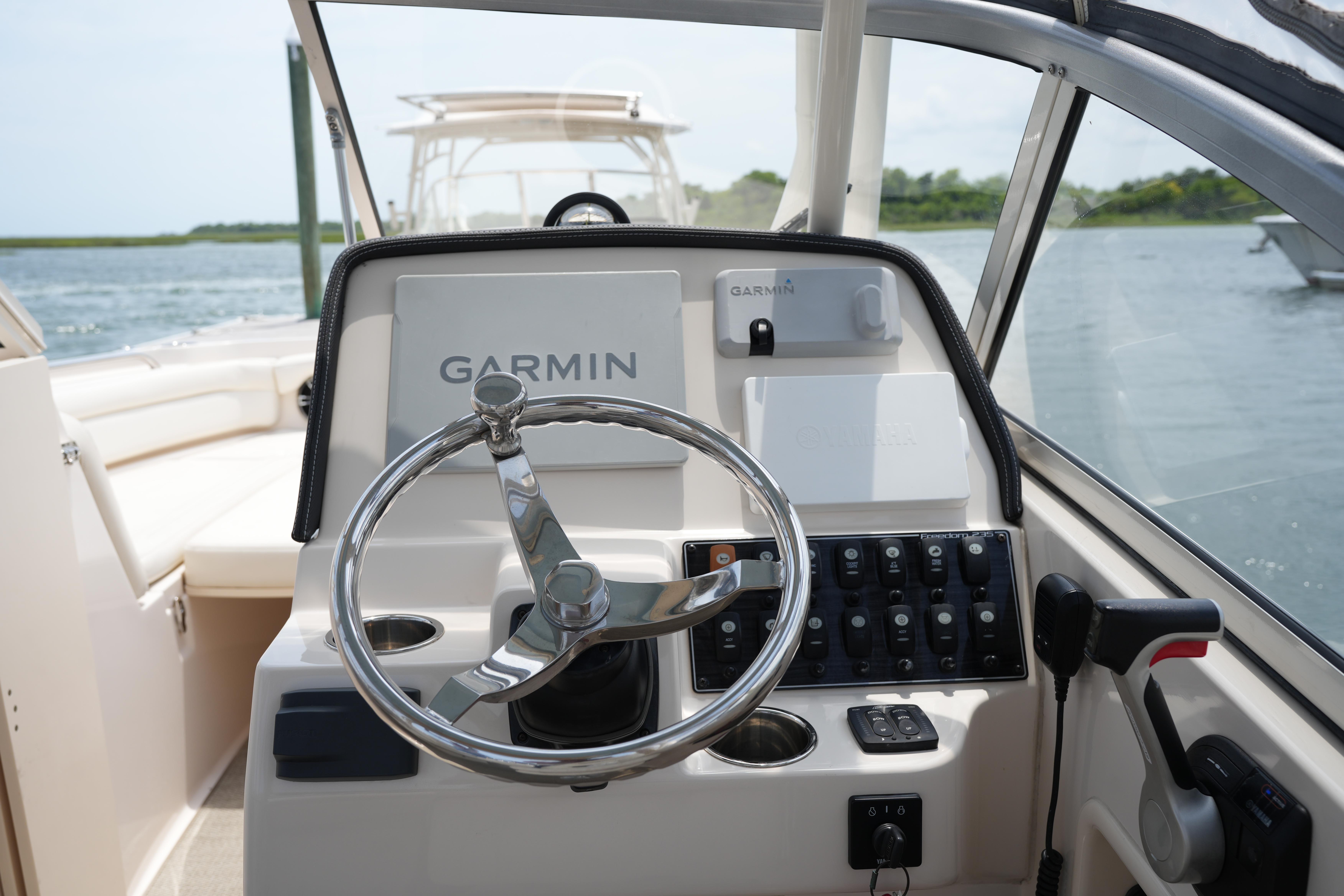 2021 Grady-White Freedom 235 boat helm with Garmin navigation system.