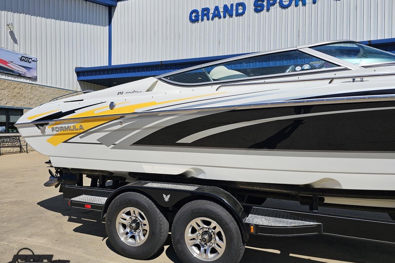 2014 Formula 292 FASTech boat on trailer outside Grand Sport Center.