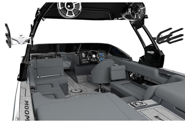 Manufacturer Provided Image: 2026 Moomba Craz boat interior with sleek gray seating and advanced dashboard features.