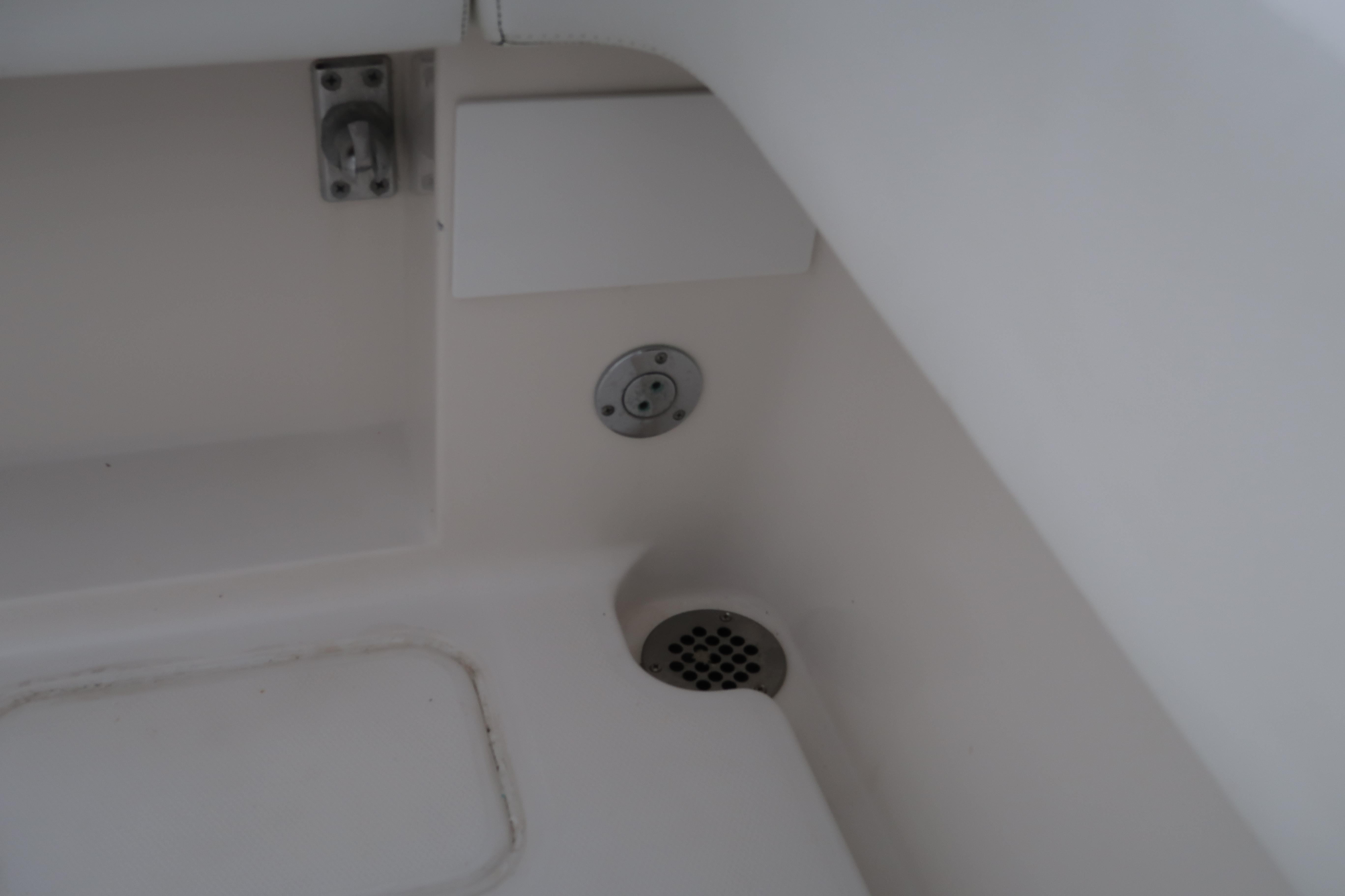 2016 Invincible 42 Open Fisherman boat interior detail showing drainage and fittings.