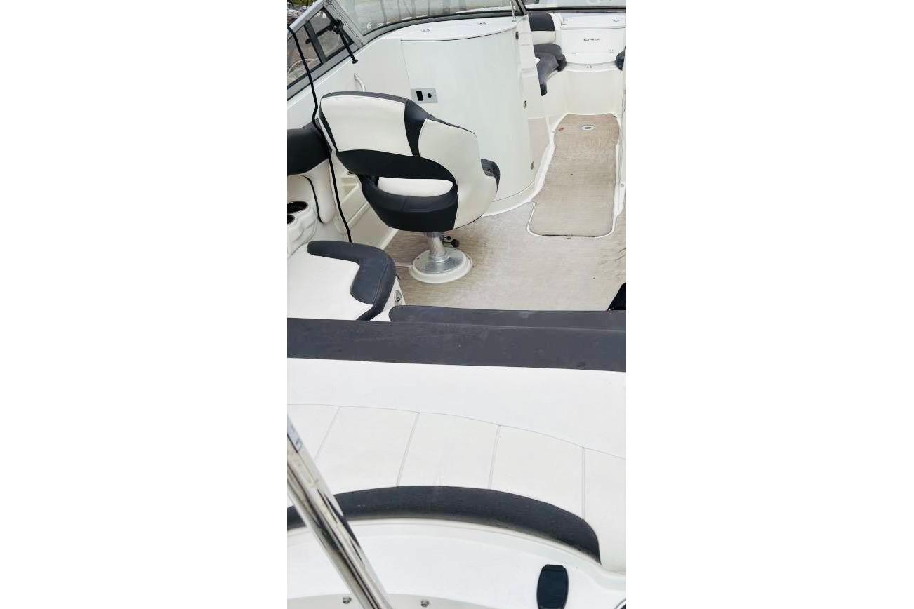 2018 Stingray 214 LR boat interior with seating and helm area.