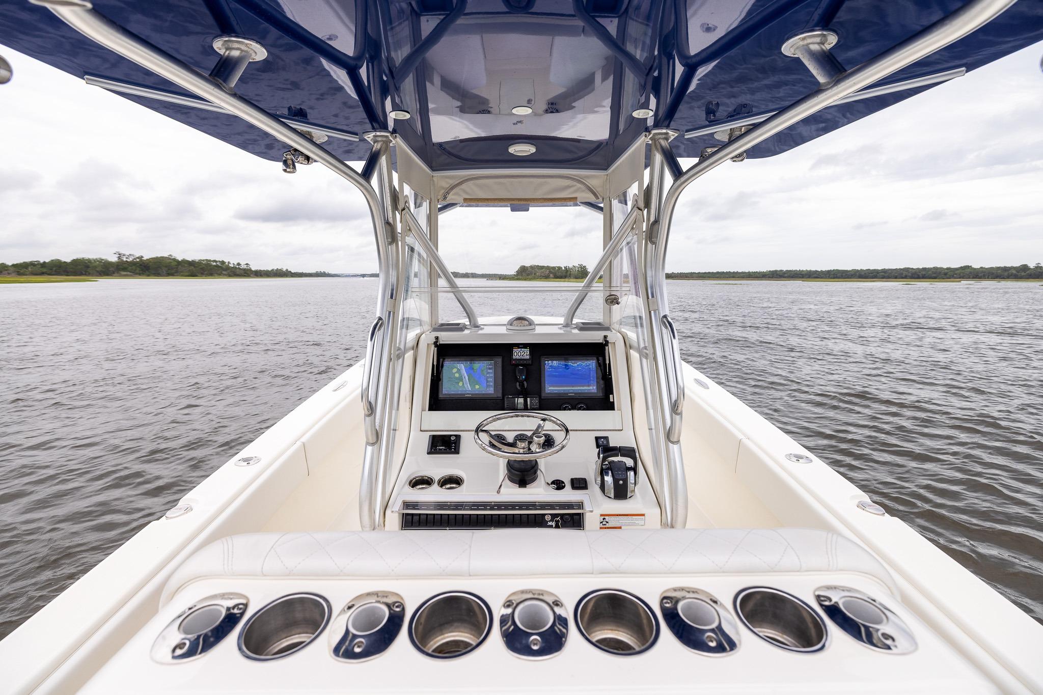 2019 SeaVee 322Z boat cockpit with navigation screens on open water.