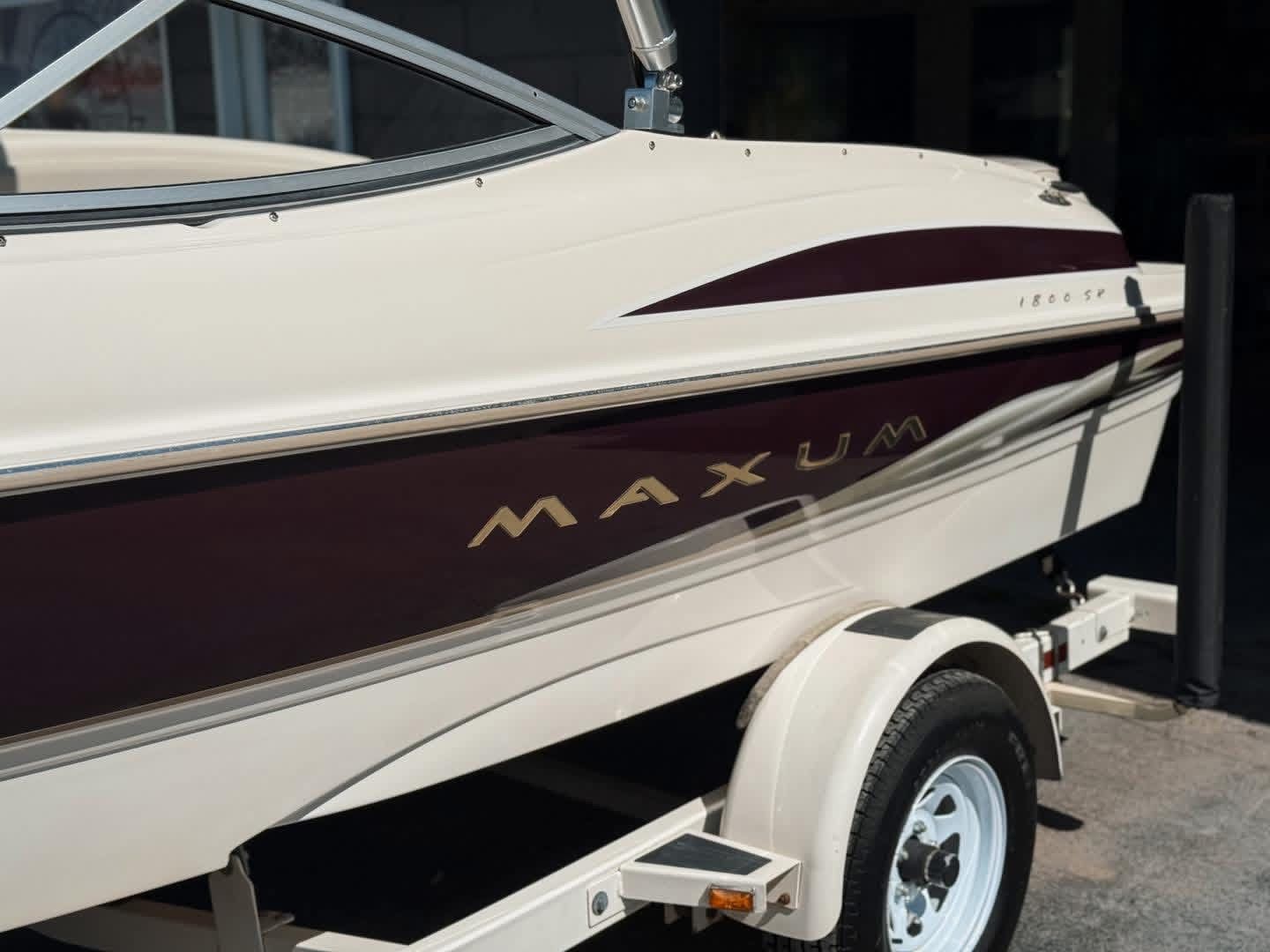 1999 Maxum 1800 SR boat on trailer, side view.