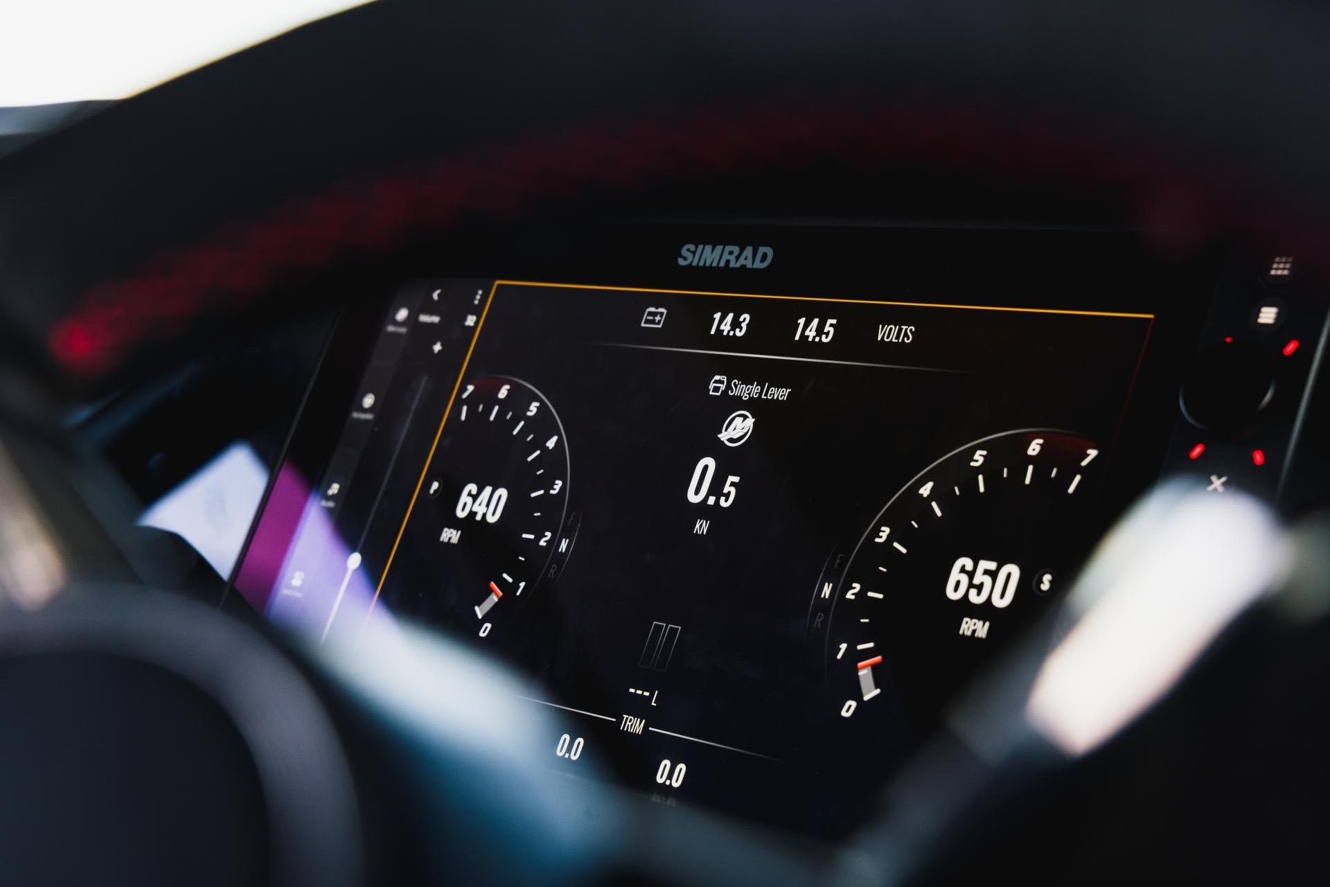 Dashboard of 2027 Axopar 45 XC Cross Cabin showing RPM and voltage readings.
