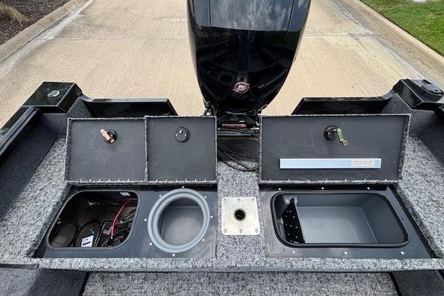 2026 Ranger VS1782SC Angler boat interior with storage compartments and motor.