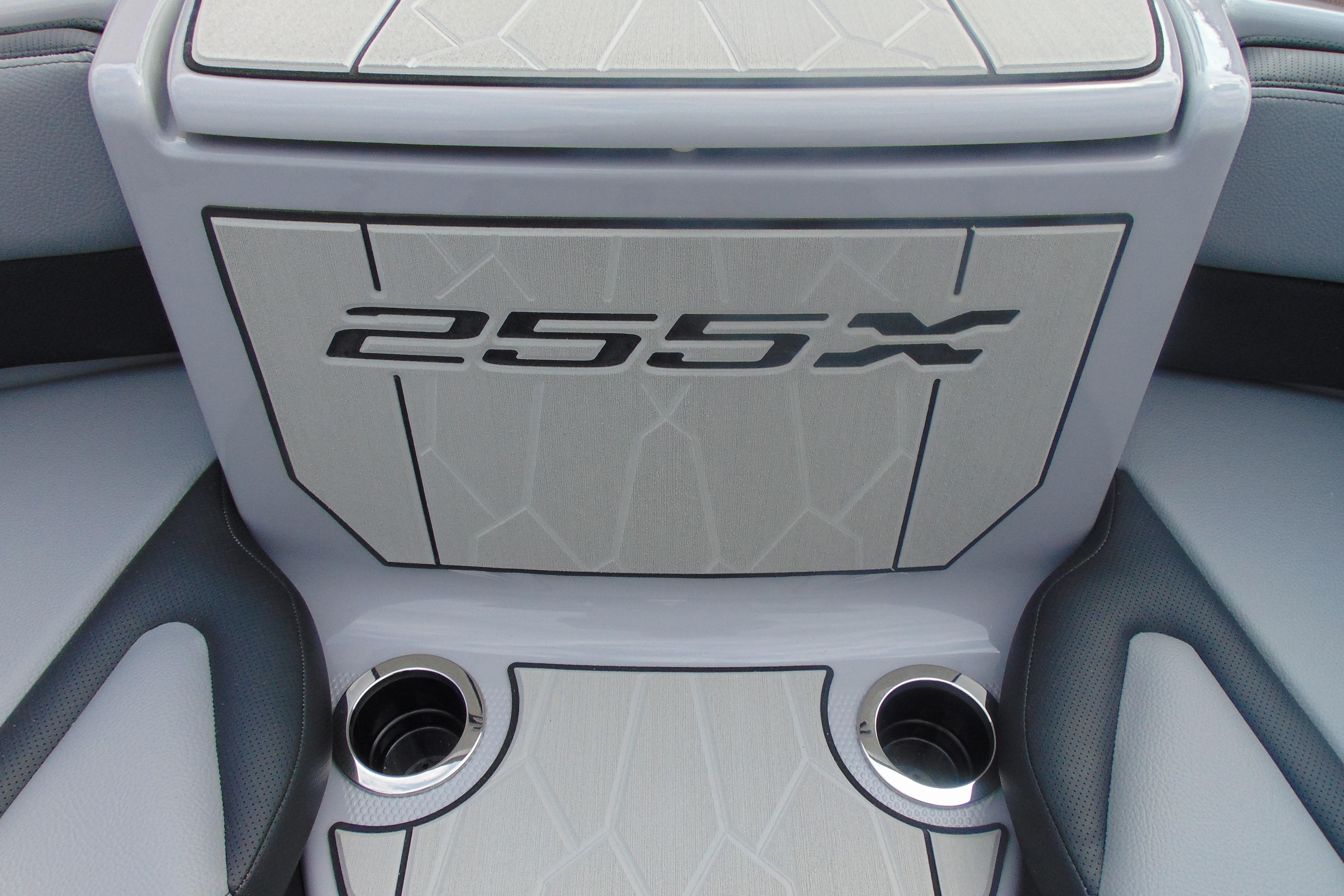 2026 Yamaha Boats 255XD interior detail with cup holders and stylish design.