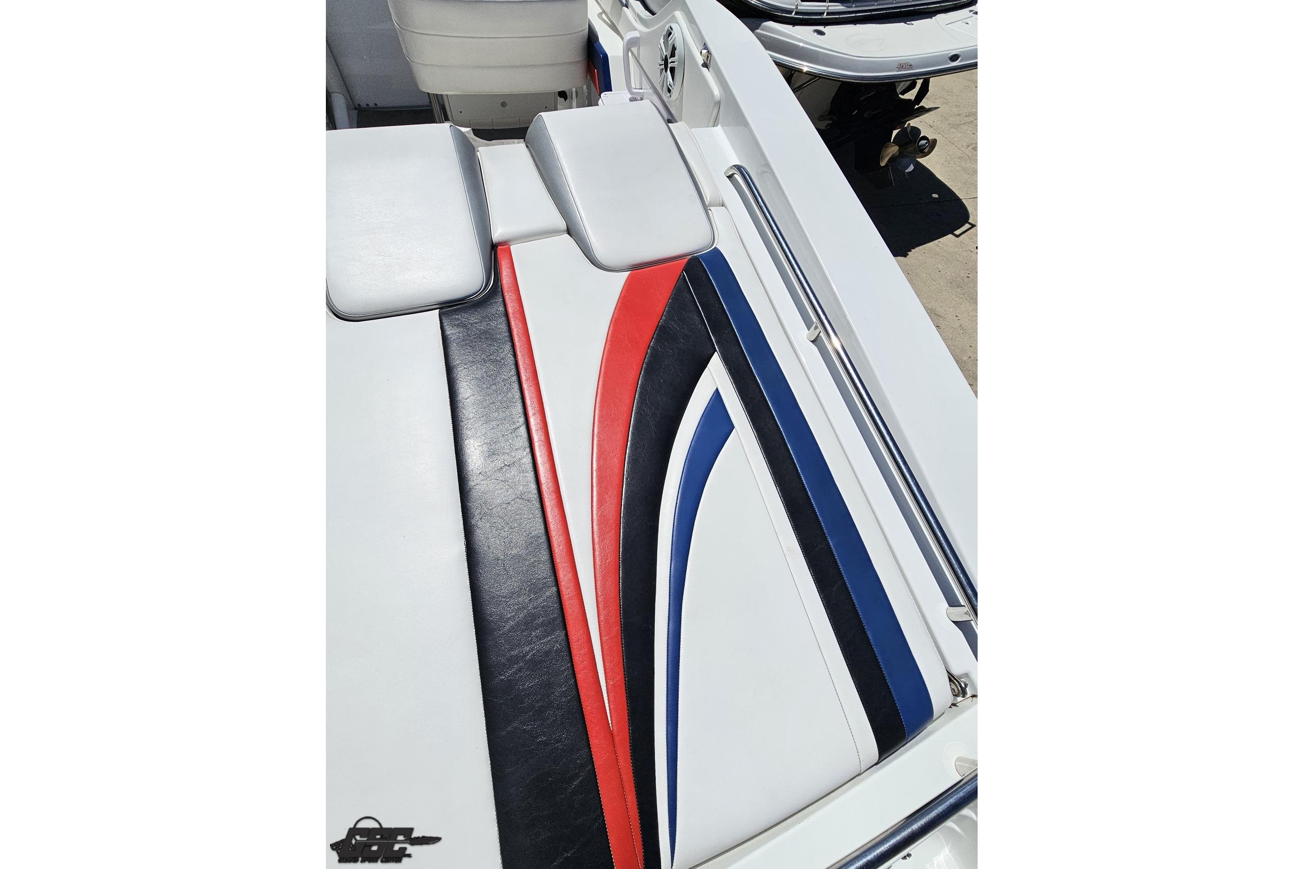 2005 Formula 271 FASTech boat interior with red, black, and blue accents.