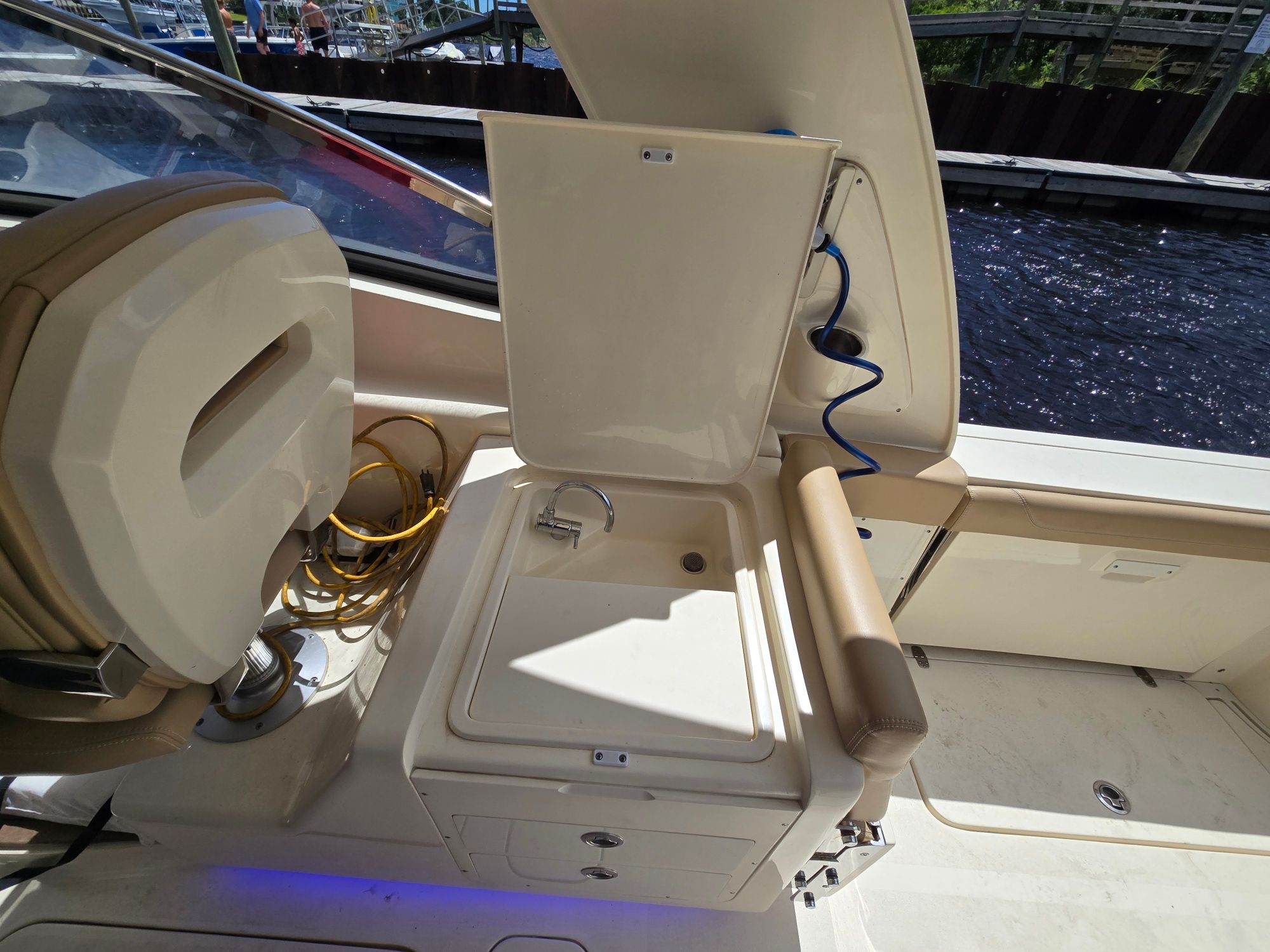 2019 Scout 275 Dorado boat with built-in sink.