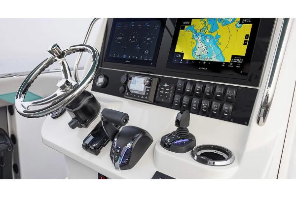 Manufacturer Provided Image: Center console of 2026 Hurricane Center Console 24 OB with navigation screens and controls.
