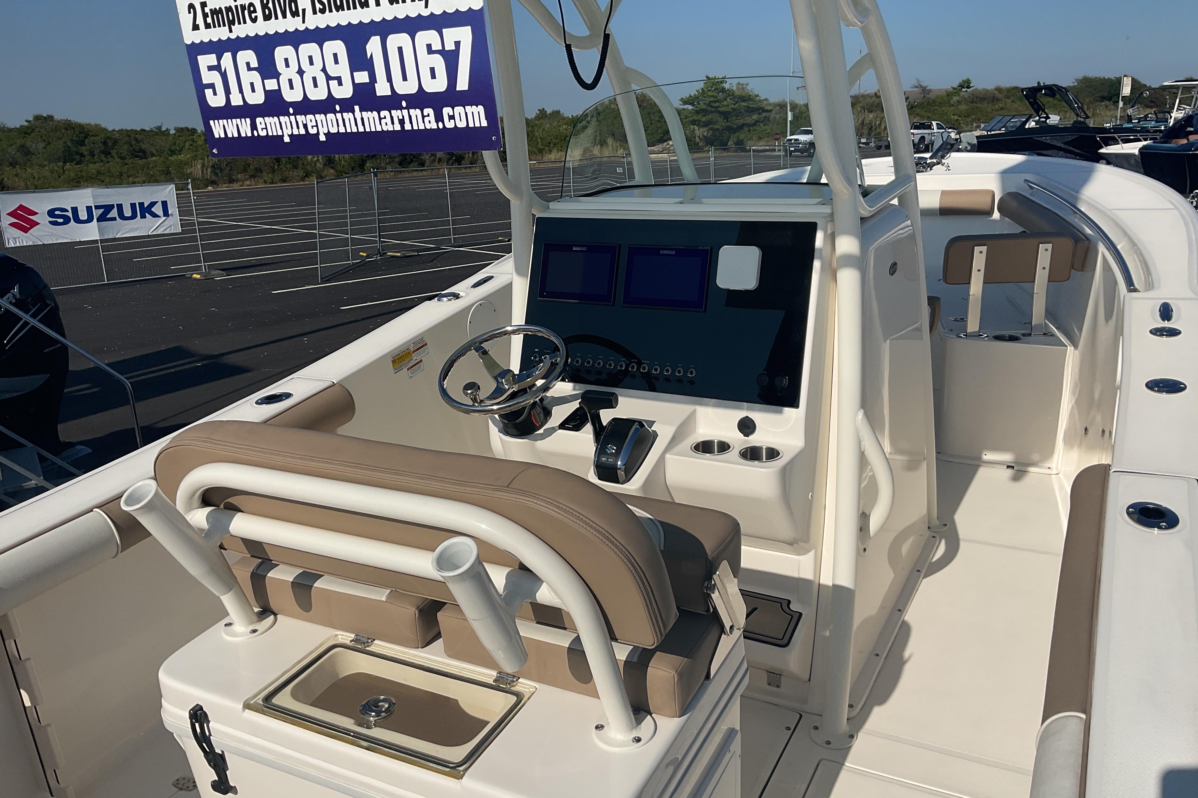 2023 Sea Born SX239 Offshore boat interior with modern helm and seating.