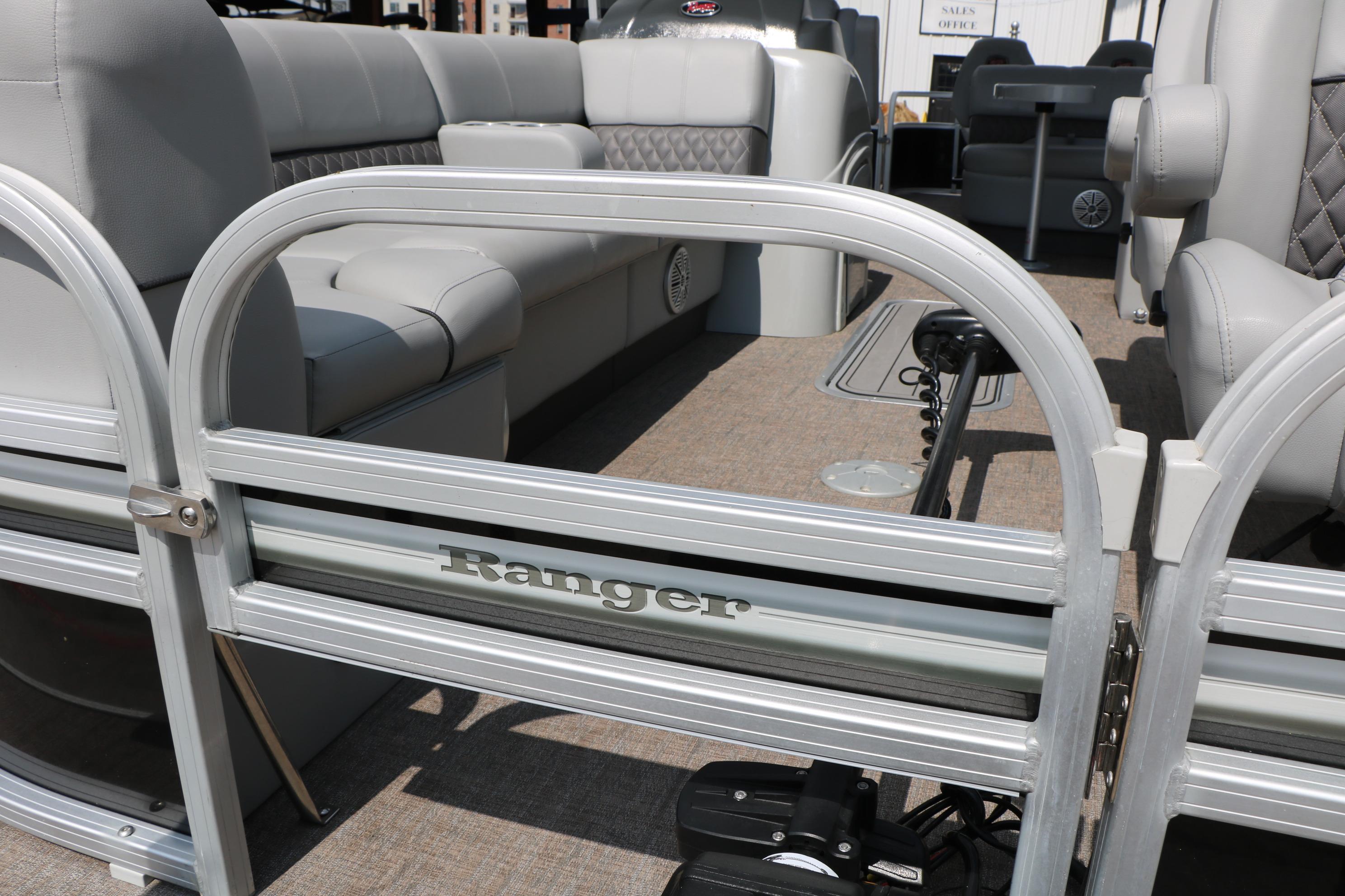 2021 Ranger 223FC pontoon boat interior with gray seating and branded gate.